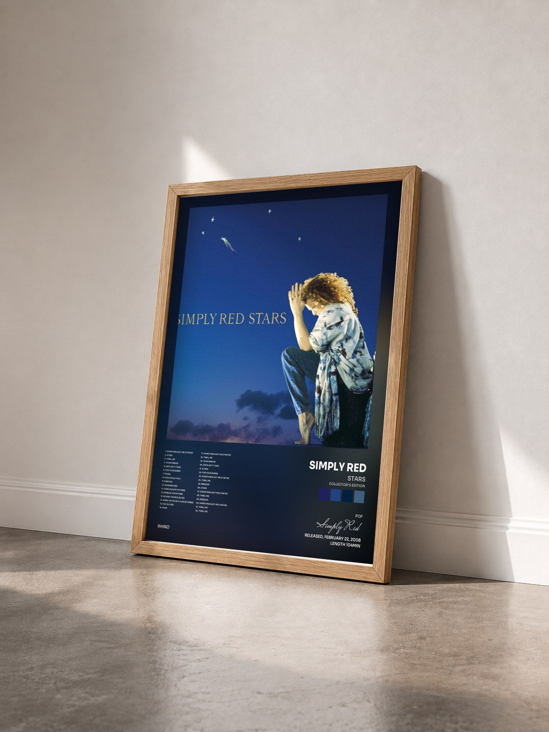 #bois Tableau de l'album Stars (Collector's Edition) de Simply Red vu de trois quarts, cadre en bois brut