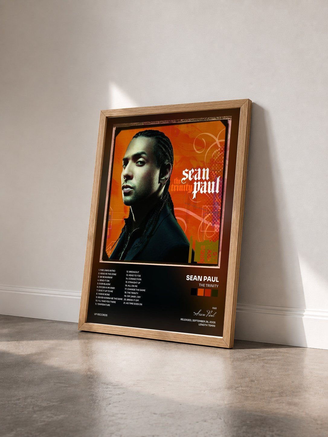 #bois Tableau de l'album The Trinity de Sean Paul vu de trois quarts, cadre en bois brut
