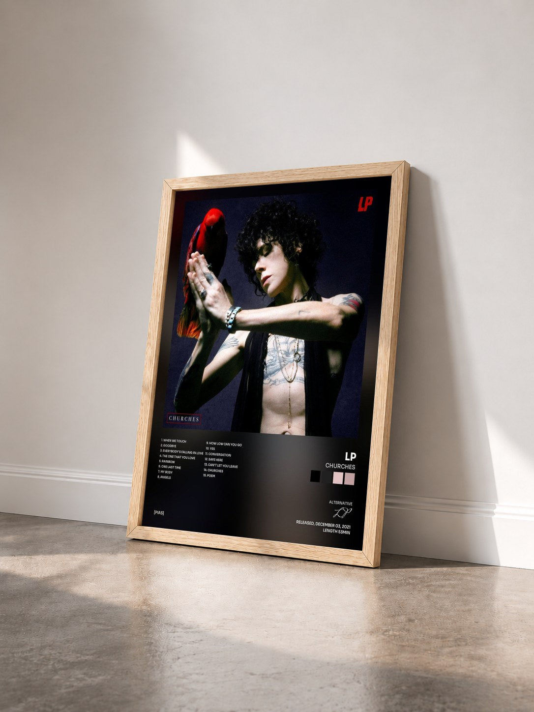 #bois Tableau de l'album Churches de LP vu de trois quarts, cadre en bois brut