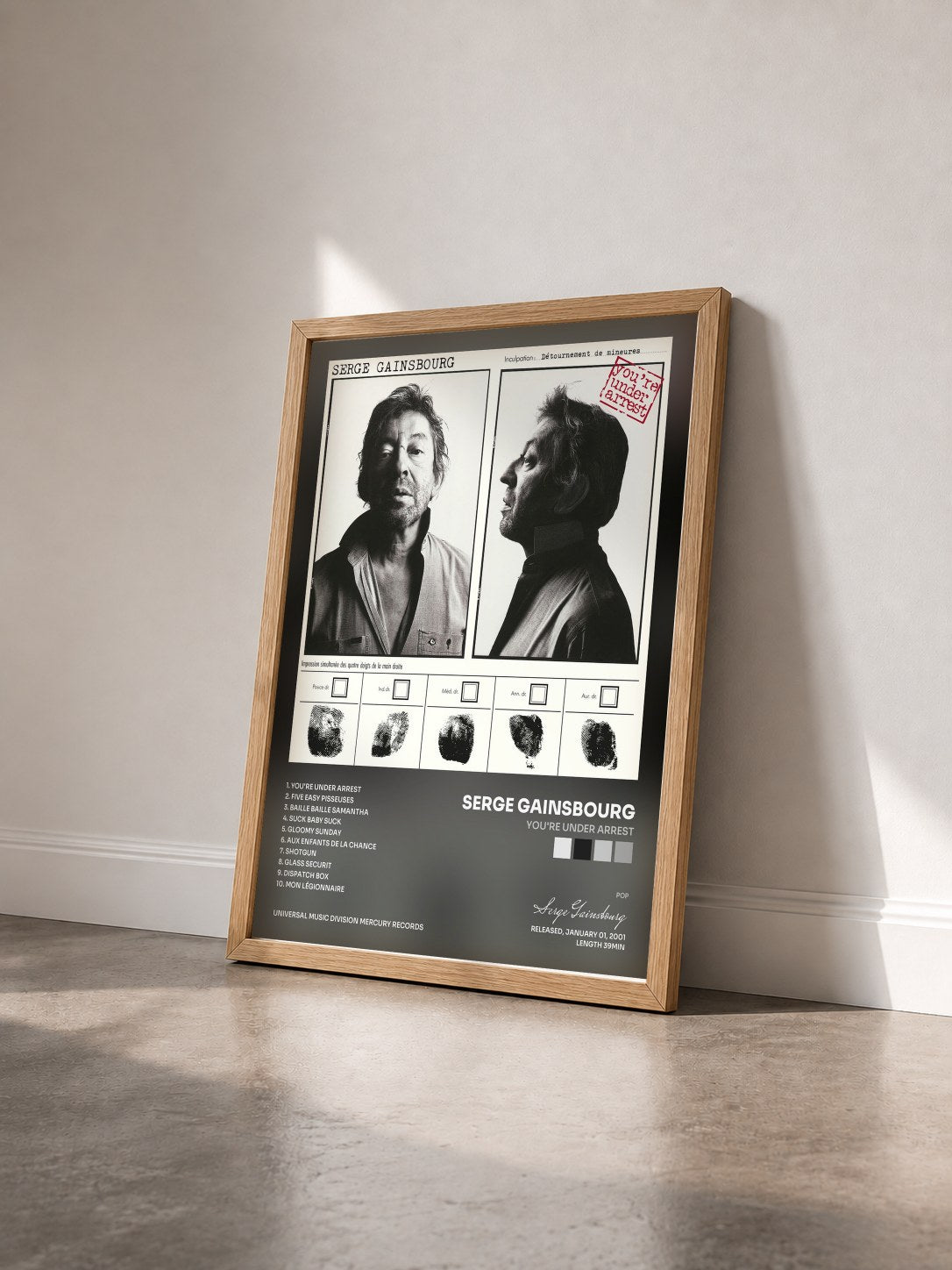 #bois Tableau de l'album You're Under Arrest de Serge Gainsbourg vu de trois quarts, cadre en bois brut