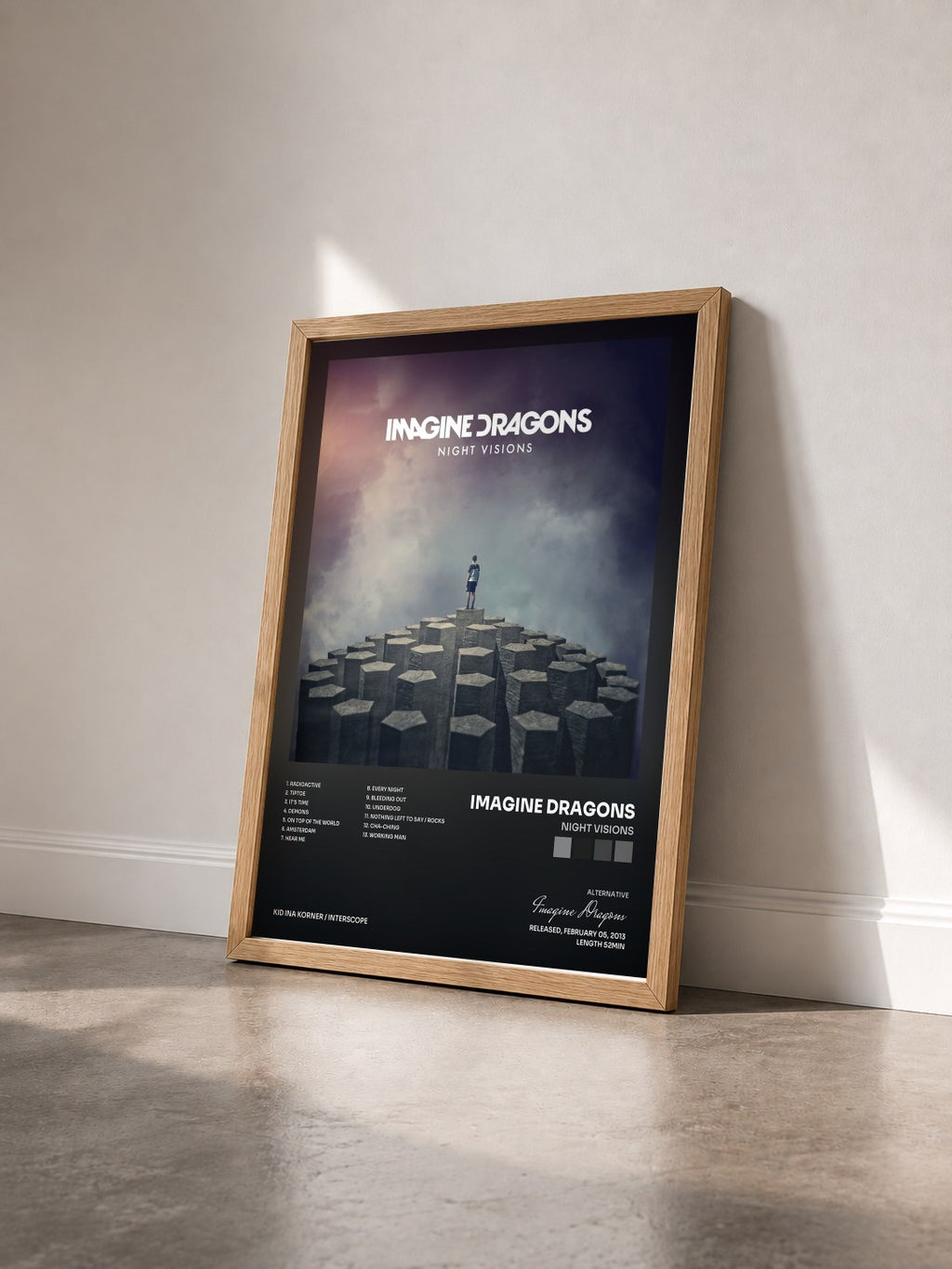 #bois Tableau de l'album Night Visions de Imagine Dragons vu de trois quarts, cadre en bois brut