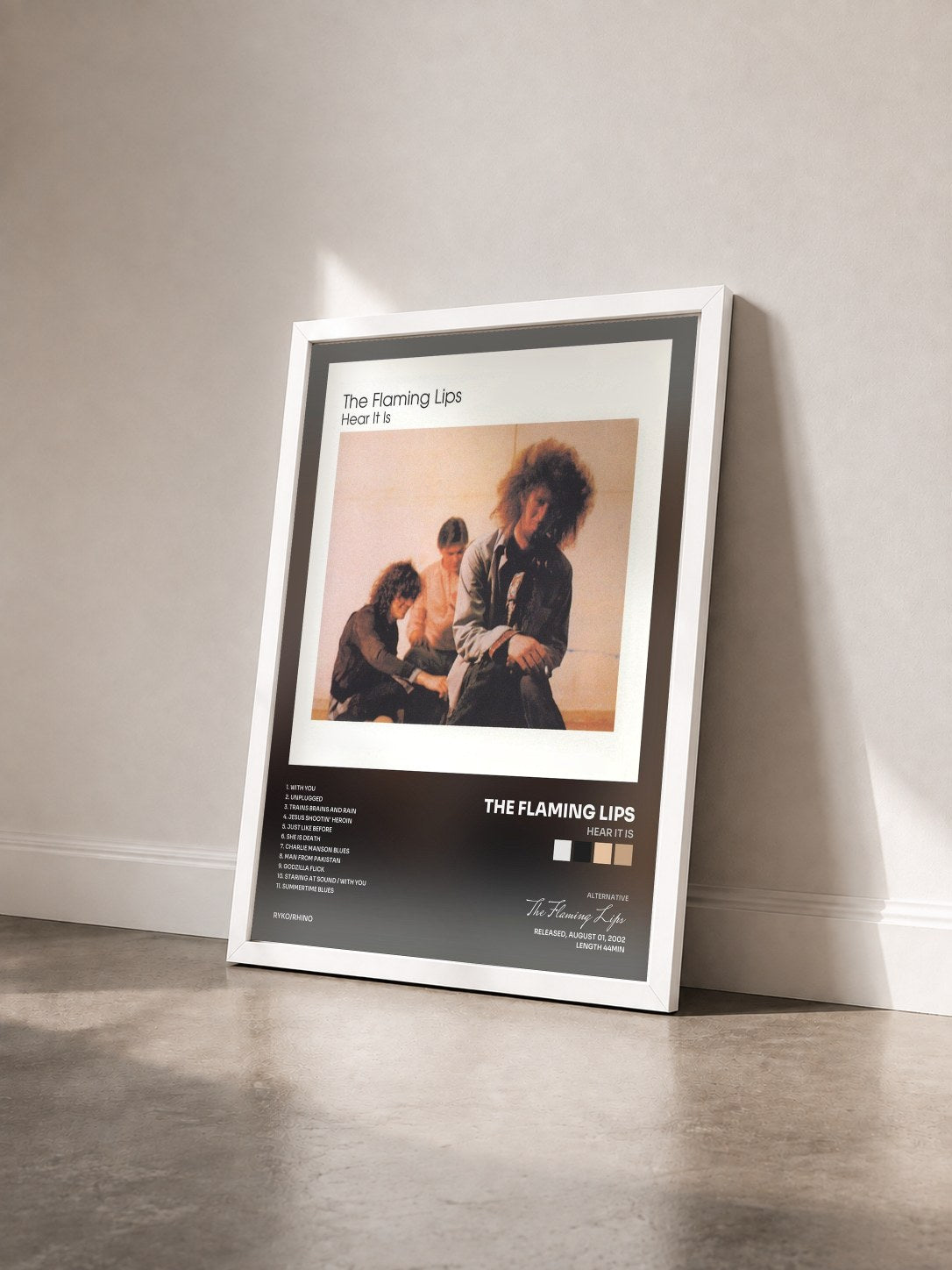 #blanc Tableau de l'album Hear It Is de The Flaming Lips vu de trois quarts, cadre blanc