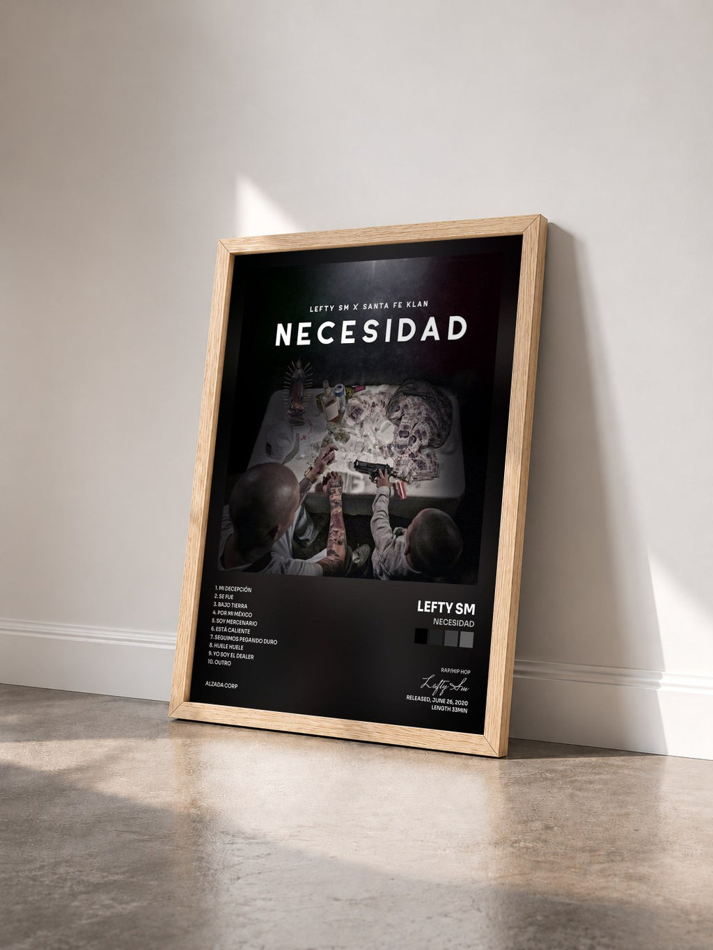 #bois Tableau de l'album Necesidad de Lefty Sm vu de trois quarts, cadre en bois brut