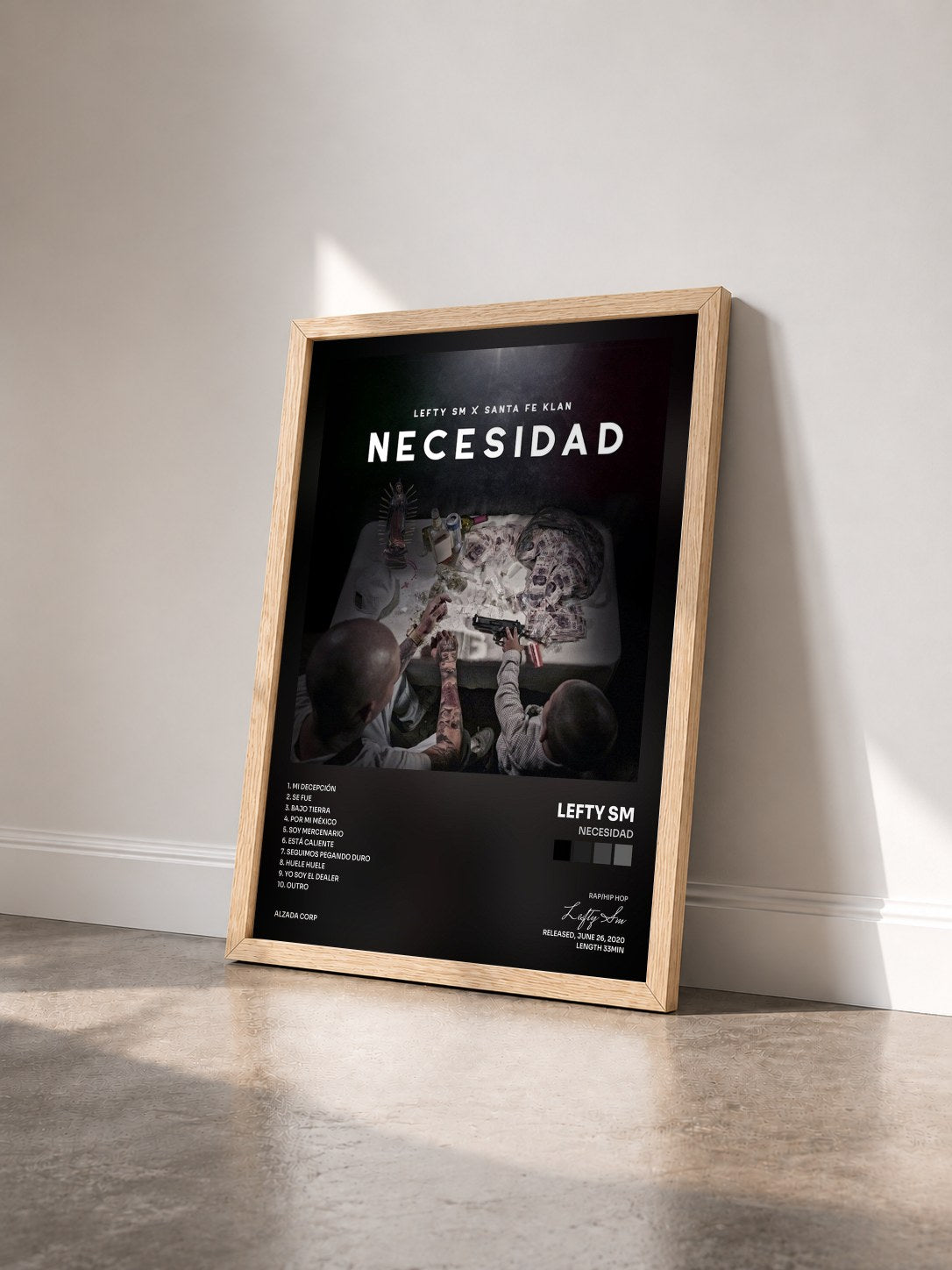#bois Tableau de l'album Necesidad de Lefty Sm vu de trois quarts, cadre en bois brut