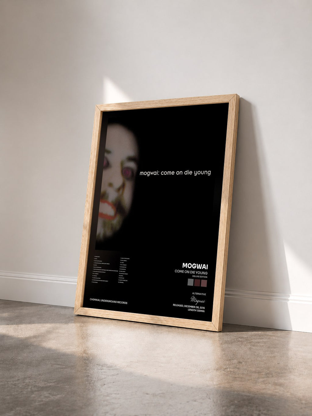 #bois Tableau de l'album Come on Die Young (Deluxe Edition) de Mogwai vu de trois quarts, cadre en bois brut