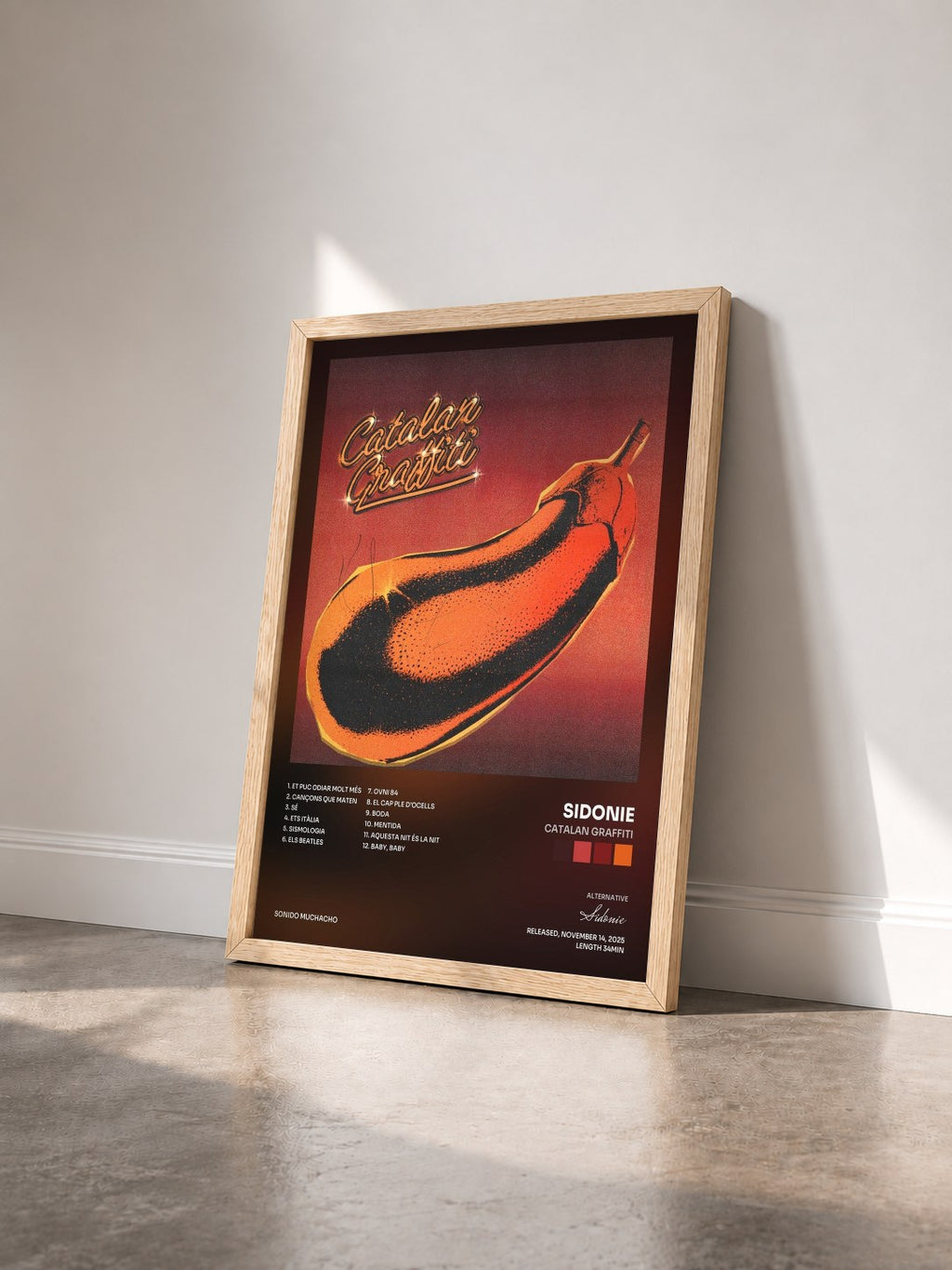 #bois Tableau de l'album Catalan Graffiti de Sidonie vu de trois quarts, cadre en bois brut