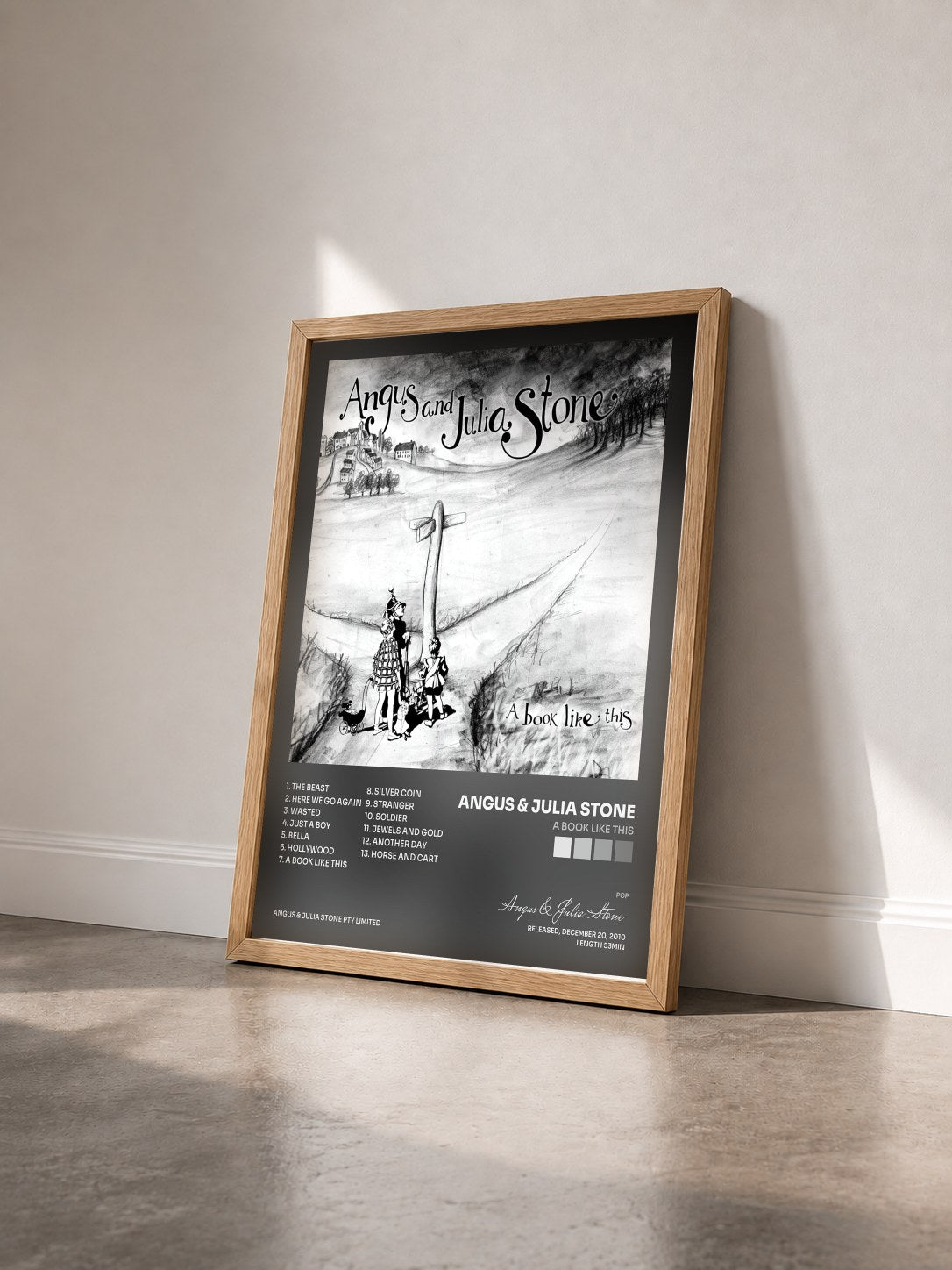 #bois Tableau de l'album A Book Like This de Angus & Julia Stone vu de trois quarts, cadre en bois brut