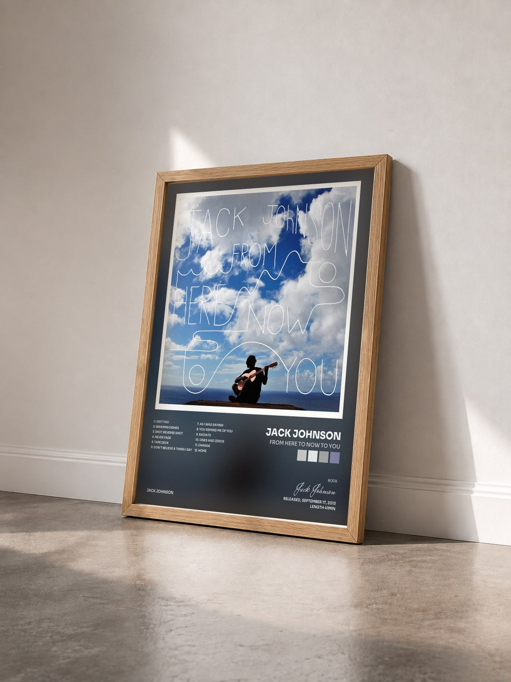 #bois Tableau de l'album From Here To Now To You de Jack Johnson vu de trois quarts, cadre en bois brut
