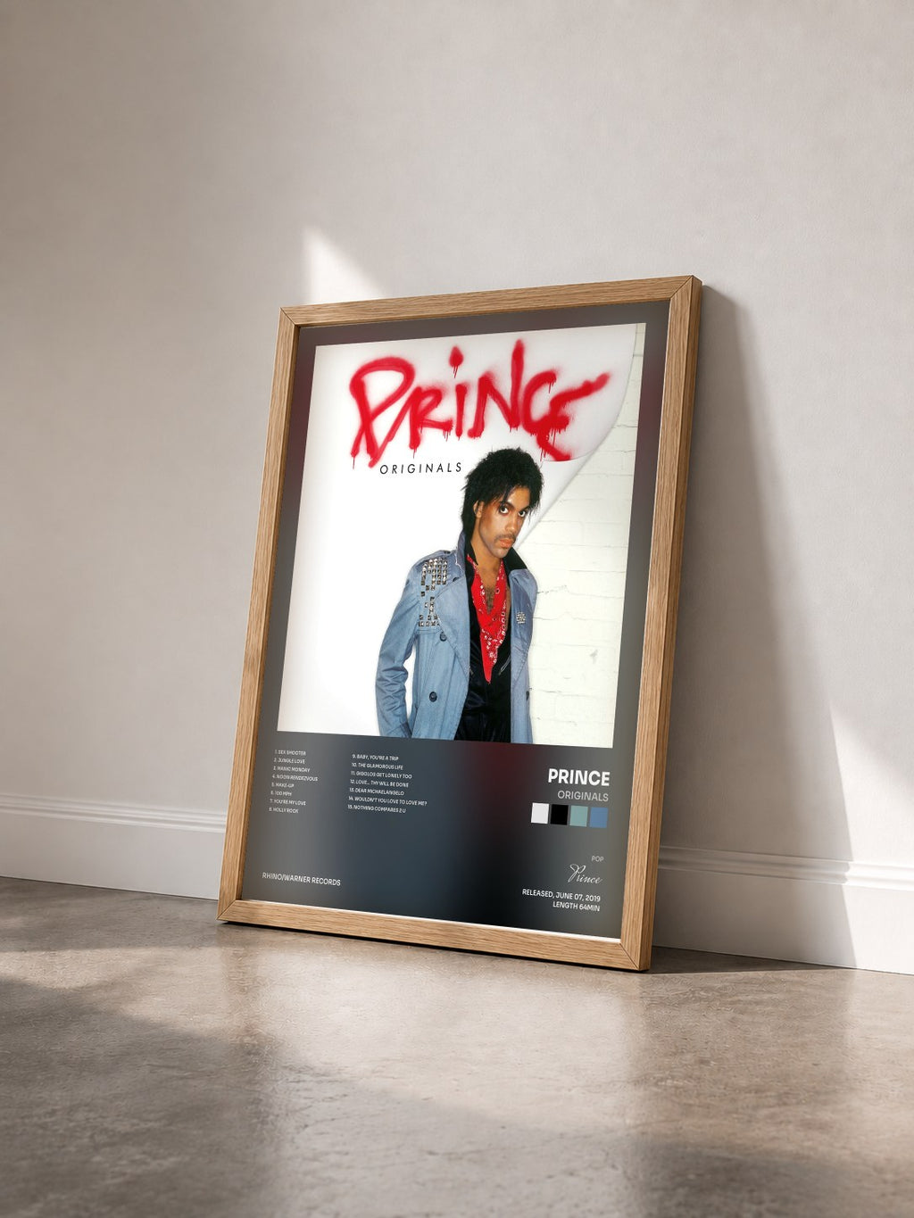 #bois Tableau de l'album Originals de Prince vu de trois quarts, cadre en bois brut