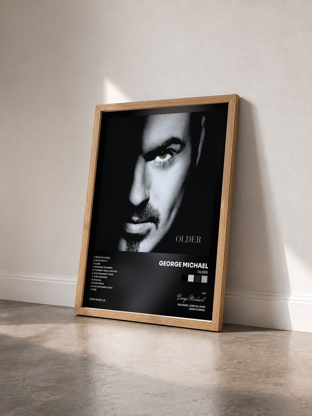 #bois Tableau de l'album Older de George Michael vu de trois quarts, cadre en bois brut