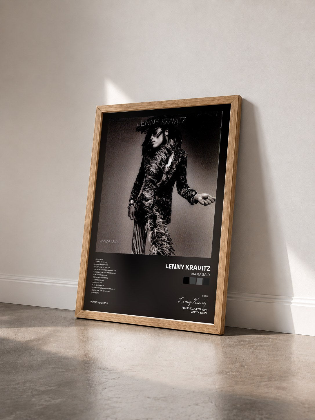 #bois Tableau de l'album Mama Said de Lenny Kravitz vu de trois quarts, cadre en bois brut