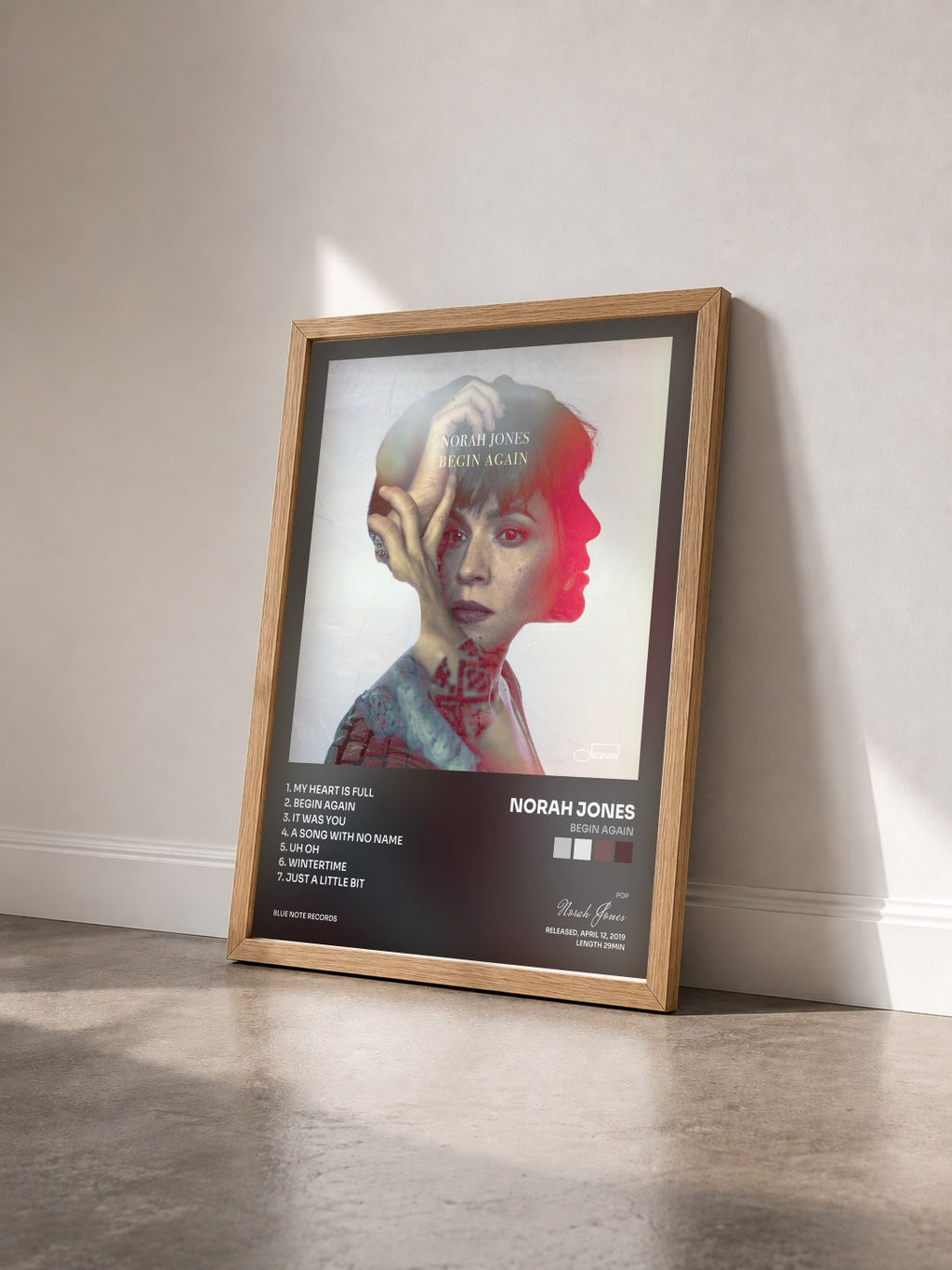 #bois Tableau de l'album Begin Again de Norah Jones vu de trois quarts, cadre en bois brut