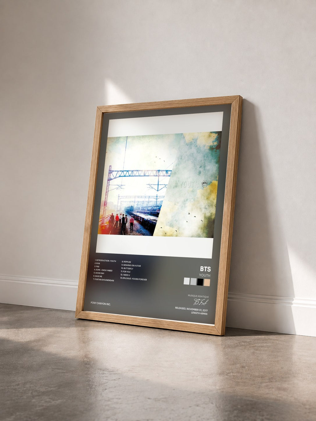 #bois Tableau de l'album Youth de BTS vu de trois quarts, cadre en bois brut