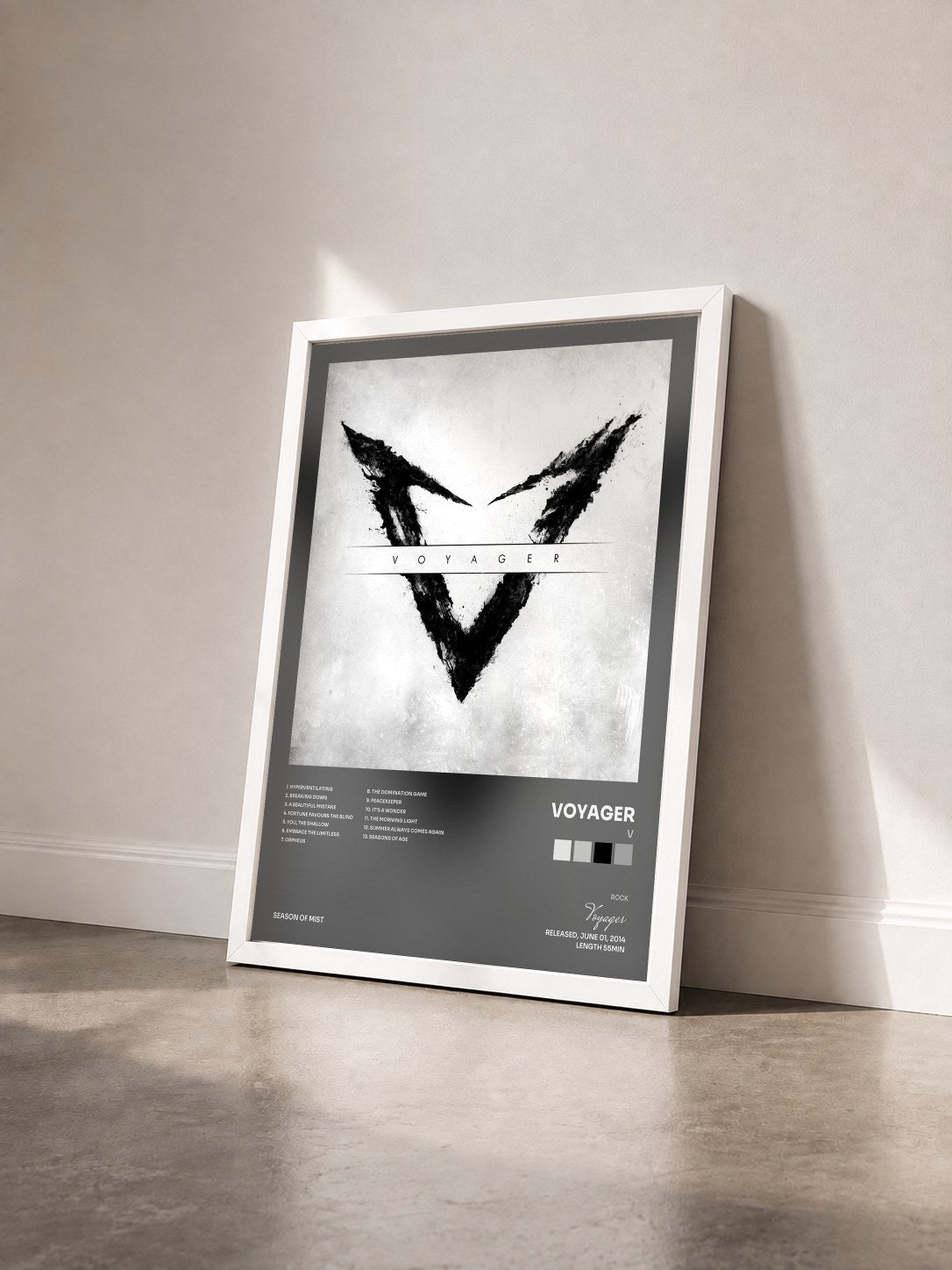 #blanc Tableau de l'album V de Voyager vu de trois quarts, cadre blanc