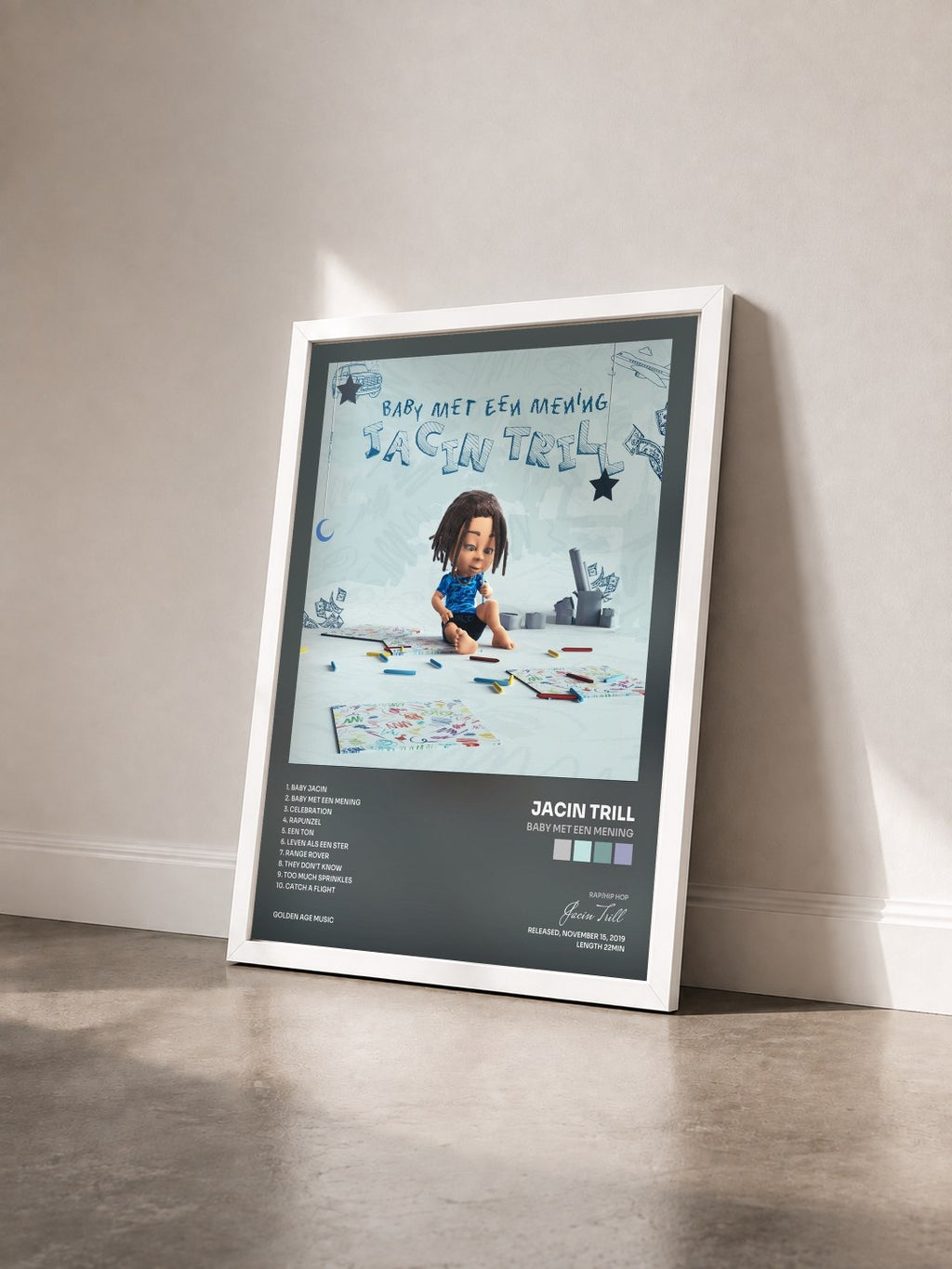 #blanc Tableau de l'album Baby met een mening de Jacin Trill vu de trois quarts, cadre blanc