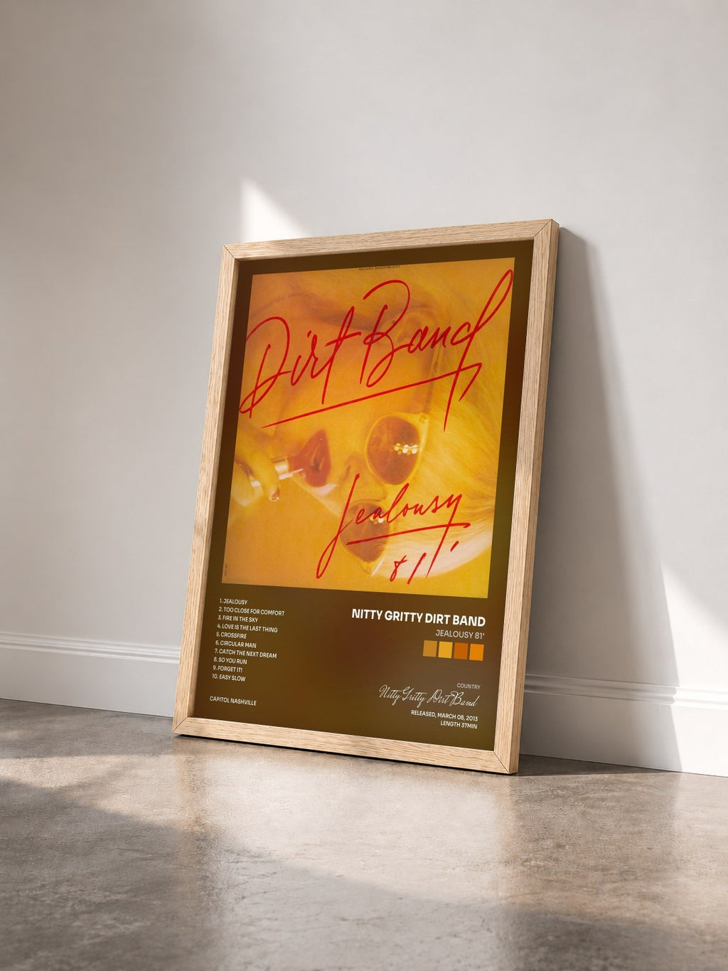 #bois Tableau de l'album Jealousy 81' de Nitty Gritty Dirt Band vu de trois quarts, cadre en bois brut