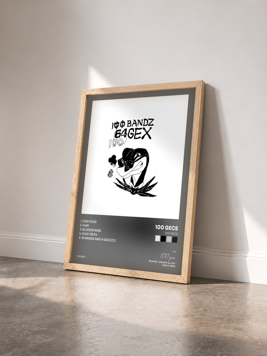#bois Tableau de l'album 100 gecs de 100 gecs vu de trois quarts, cadre en bois brut