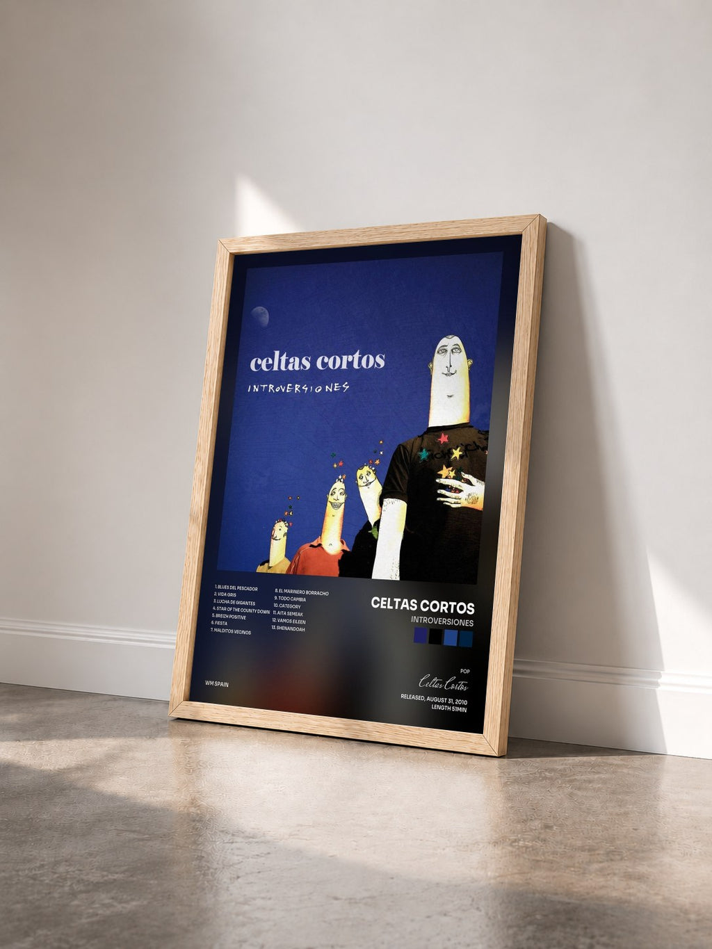 #bois Tableau de l'album Introversiones de Celtas Cortos vu de trois quarts, cadre en bois brut