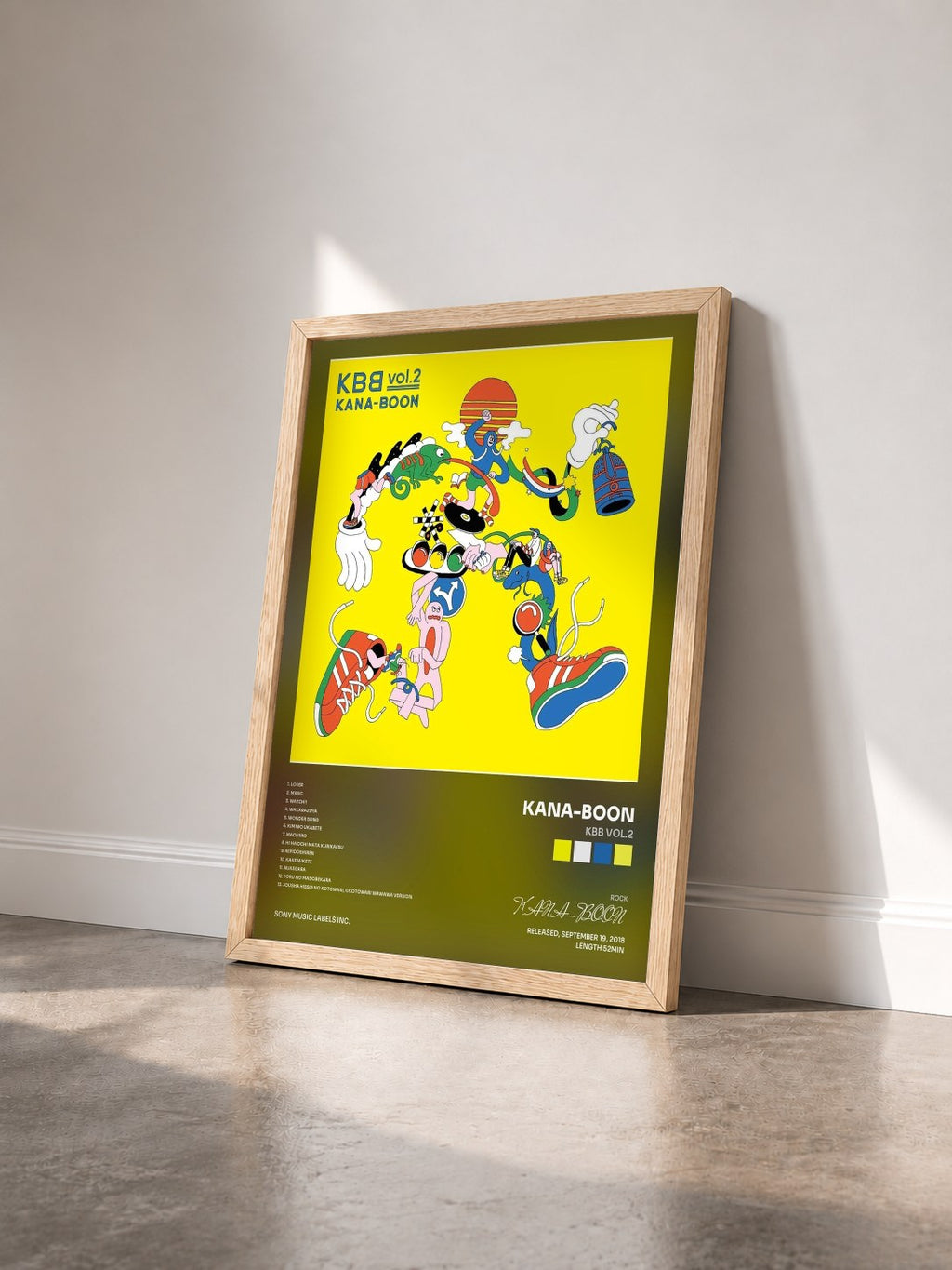 #bois Tableau de l'album KBB vol.2 de KANA-BOON vu de trois quarts, cadre en bois brut