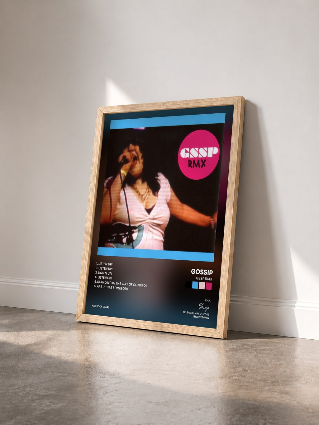 #bois Tableau de l'album GSSP RMX de Gossip vu de trois quarts, cadre en bois brut
