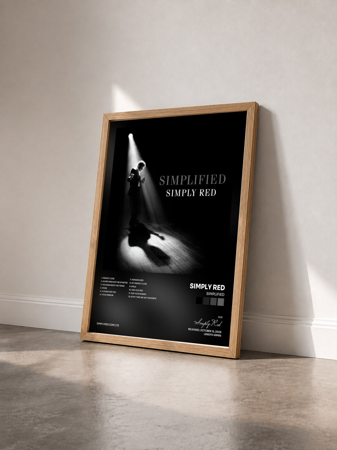 #bois Tableau de l'album Simplified de Simply Red vu de trois quarts, cadre en bois brut