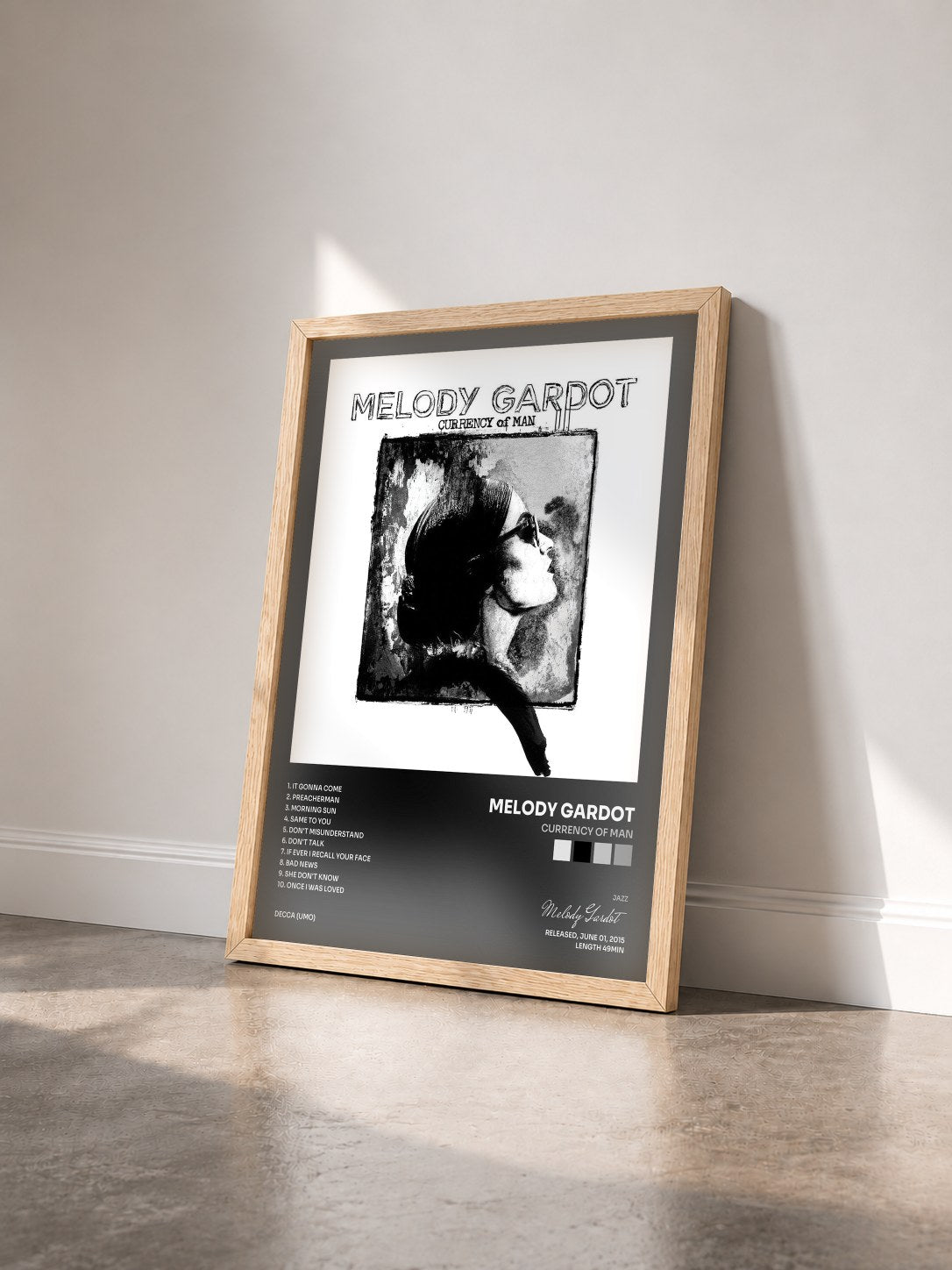 #bois Tableau de l'album Currency Of Man de Melody Gardot vu de trois quarts, cadre en bois brut