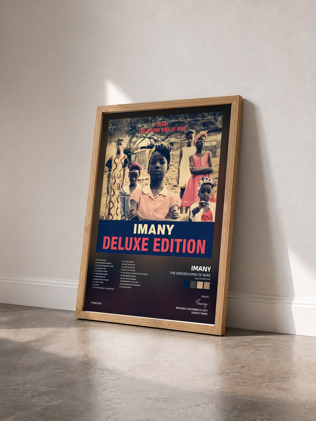 #bois Tableau de l'album The Wrong Kind of War (Deluxe Edition) de Imany vu de trois quarts, cadre en bois brut
