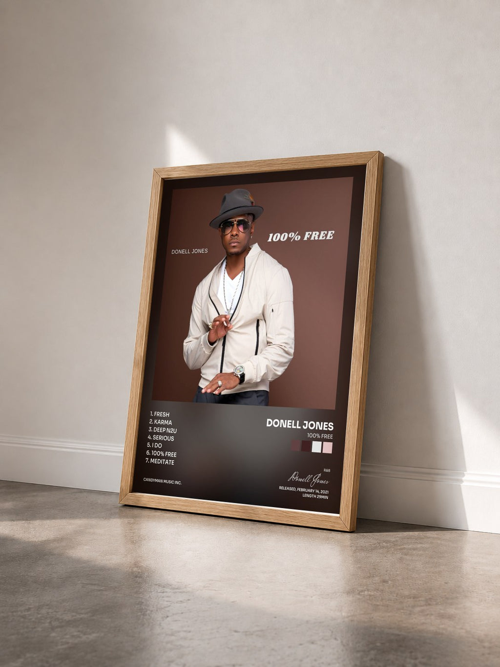 #bois Tableau de l'album 100% Free de Donell Jones vu de trois quarts, cadre en bois brut