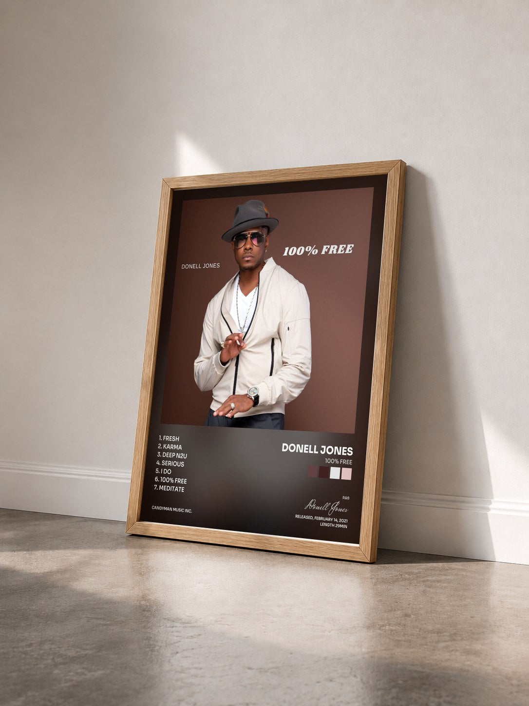 #bois Tableau de l'album 100% Free de Donell Jones vu de trois quarts, cadre en bois brut