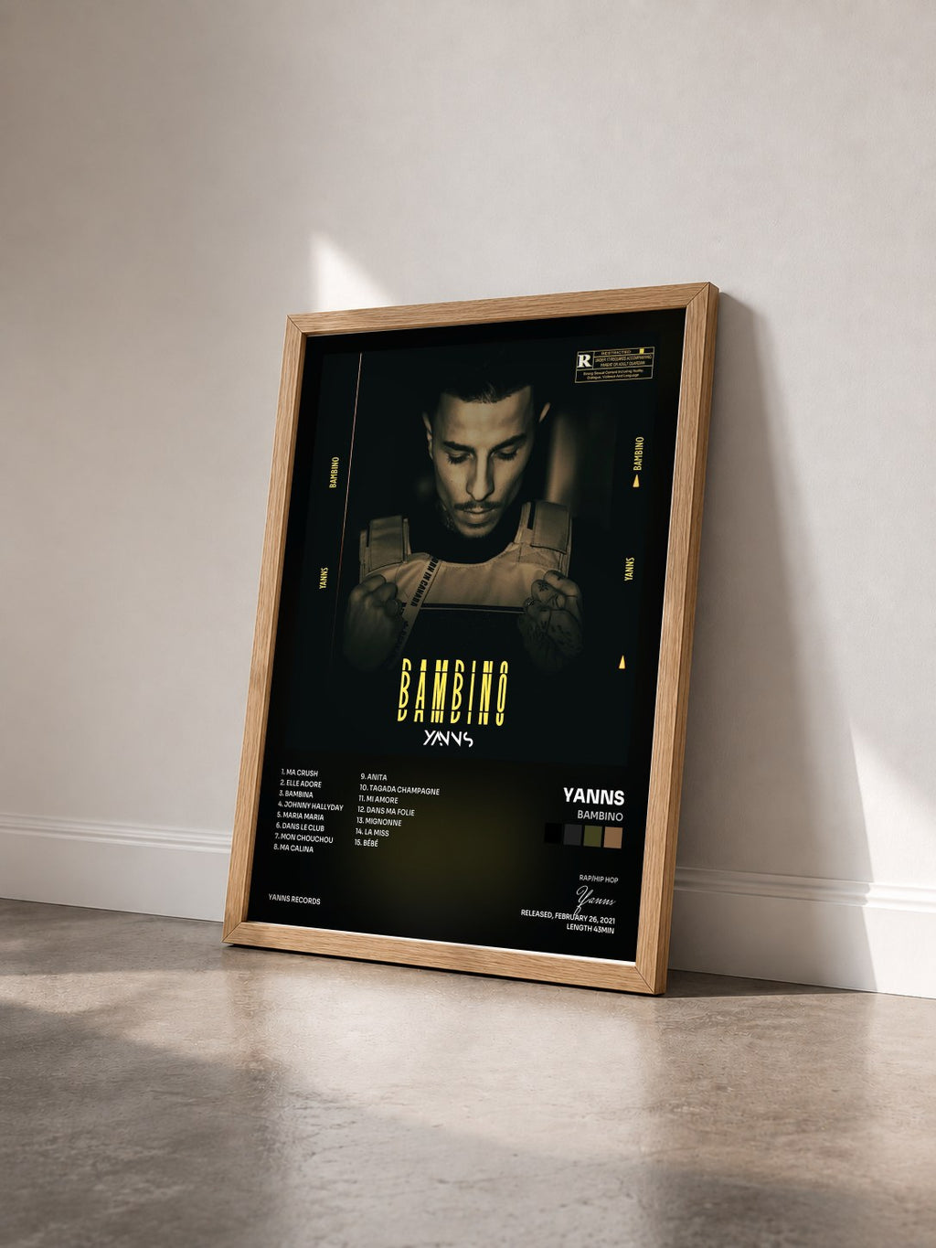 #bois Tableau de l'album Bambino de Yanns vu de trois quarts, cadre en bois brut