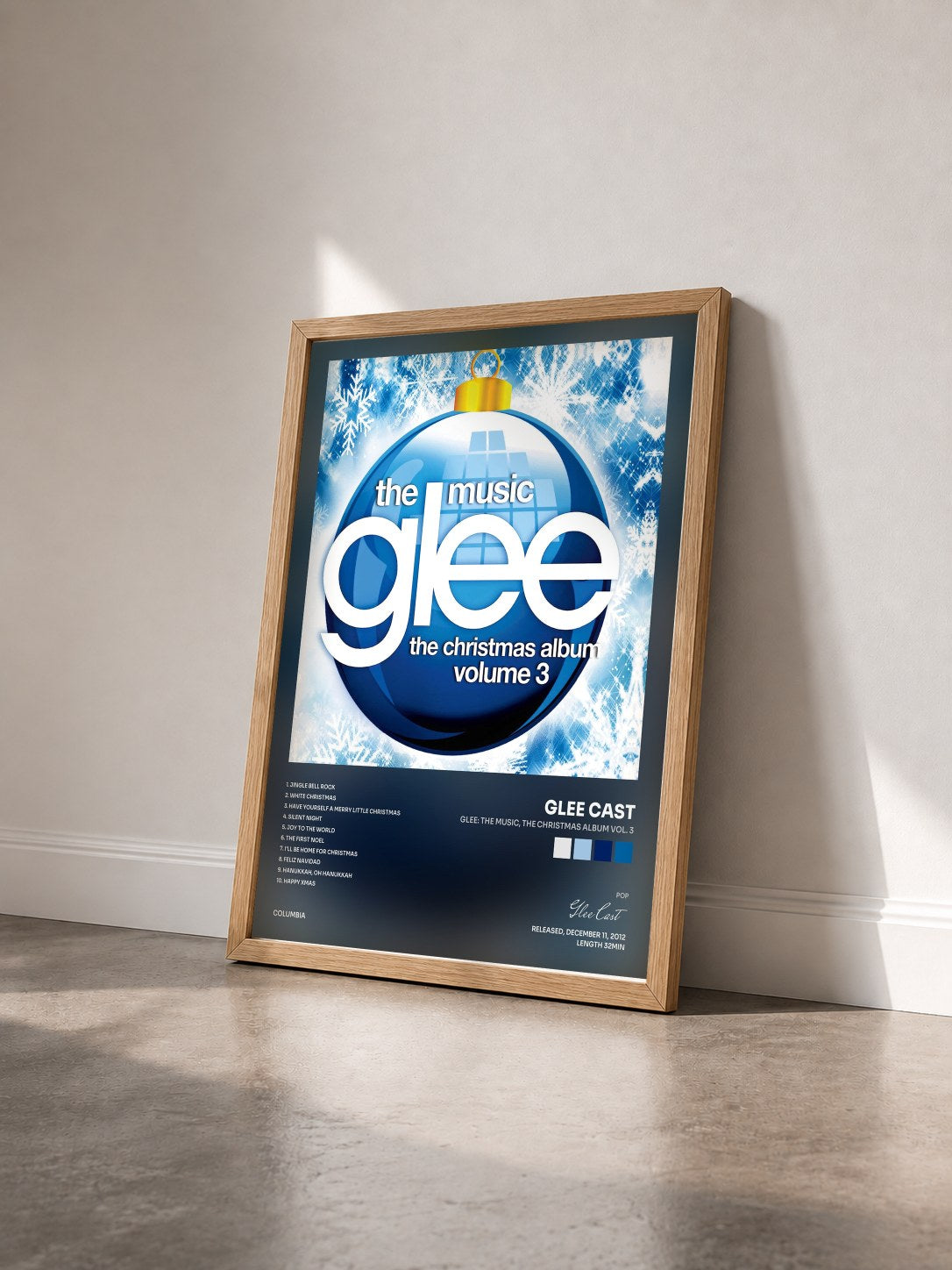 #bois Tableau de l'album Glee: The Music, The Christmas Album Vol. 3 de Glee Cast vu de trois quarts, cadre en bois brut