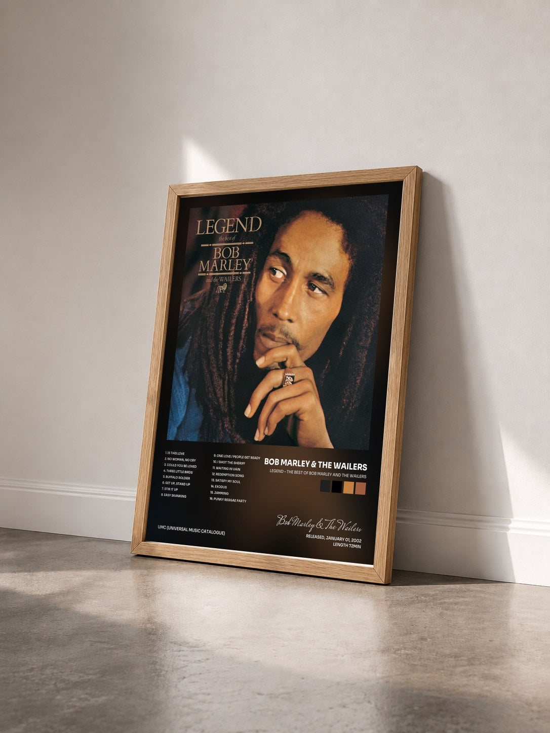 #bois Tableau de l'album Legend - The Best Of Bob Marley And The Wailers de Bob Marley & The Wailers vu de trois quarts, cadre en bois brut