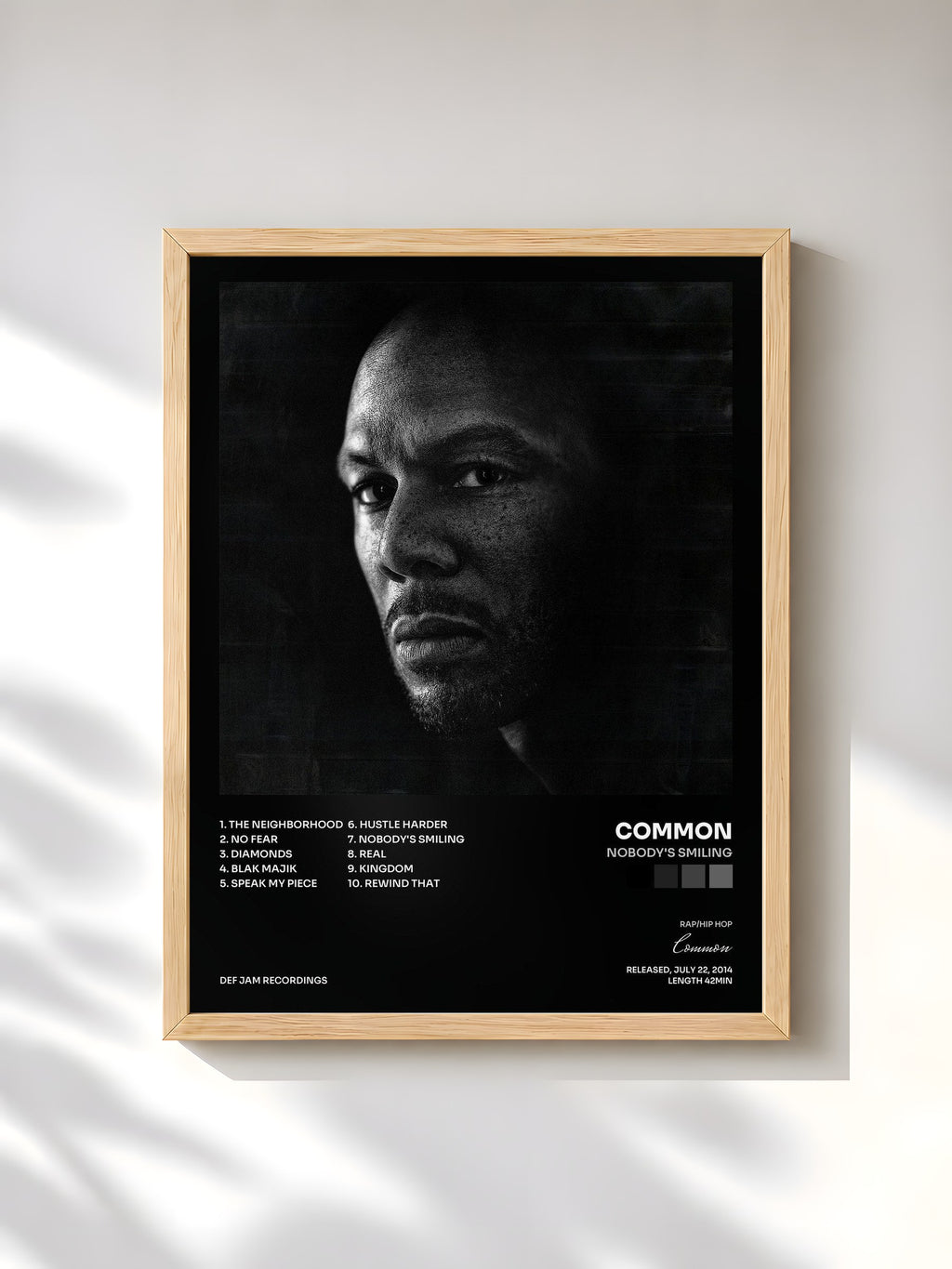 #bois Tableau de l'album Nobody's Smiling de Common, cadre en bois brut, imprimé et encadré en France