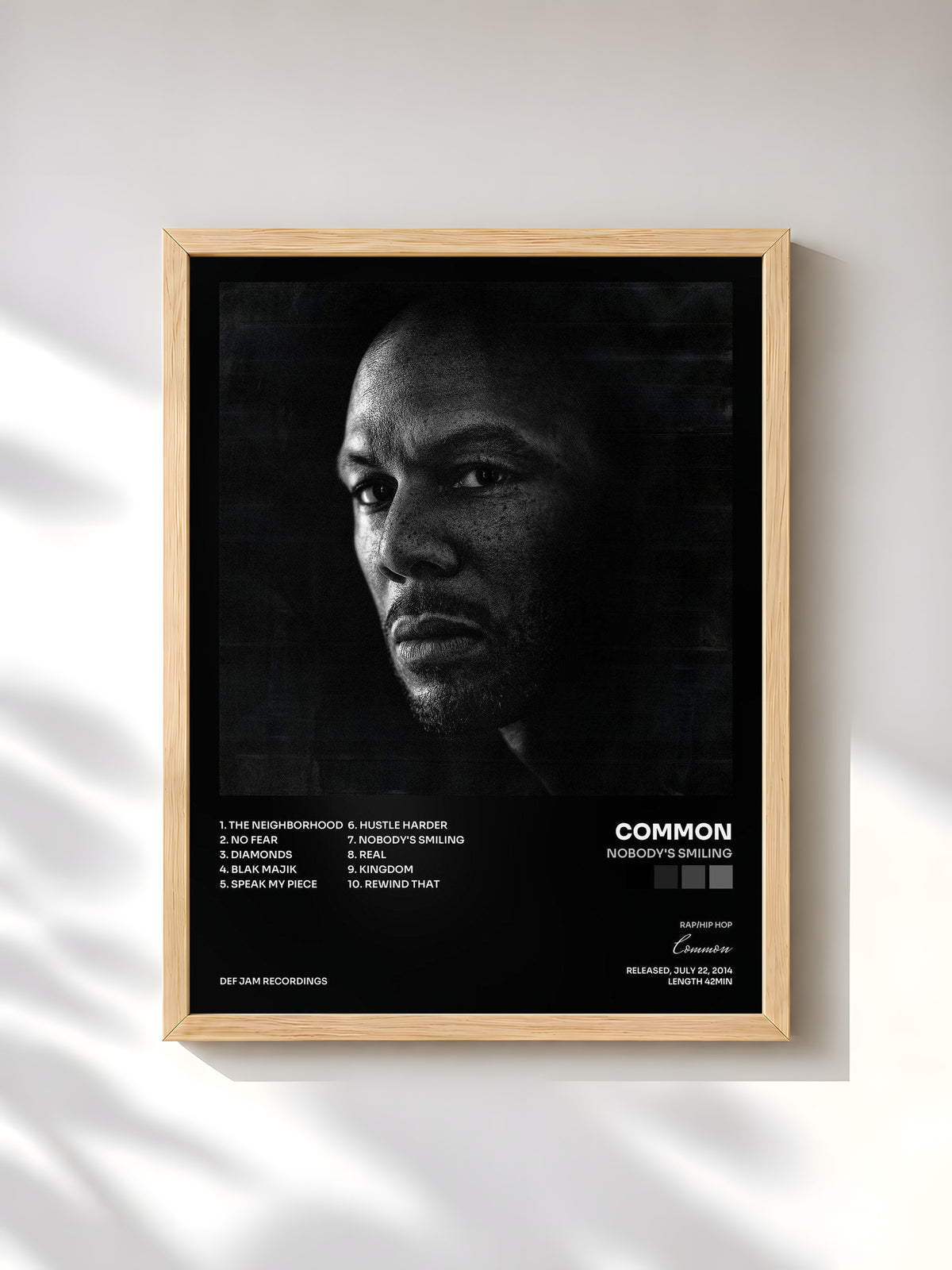 #bois Tableau de l'album Nobody's Smiling de Common, cadre en bois brut, imprimé et encadré en France