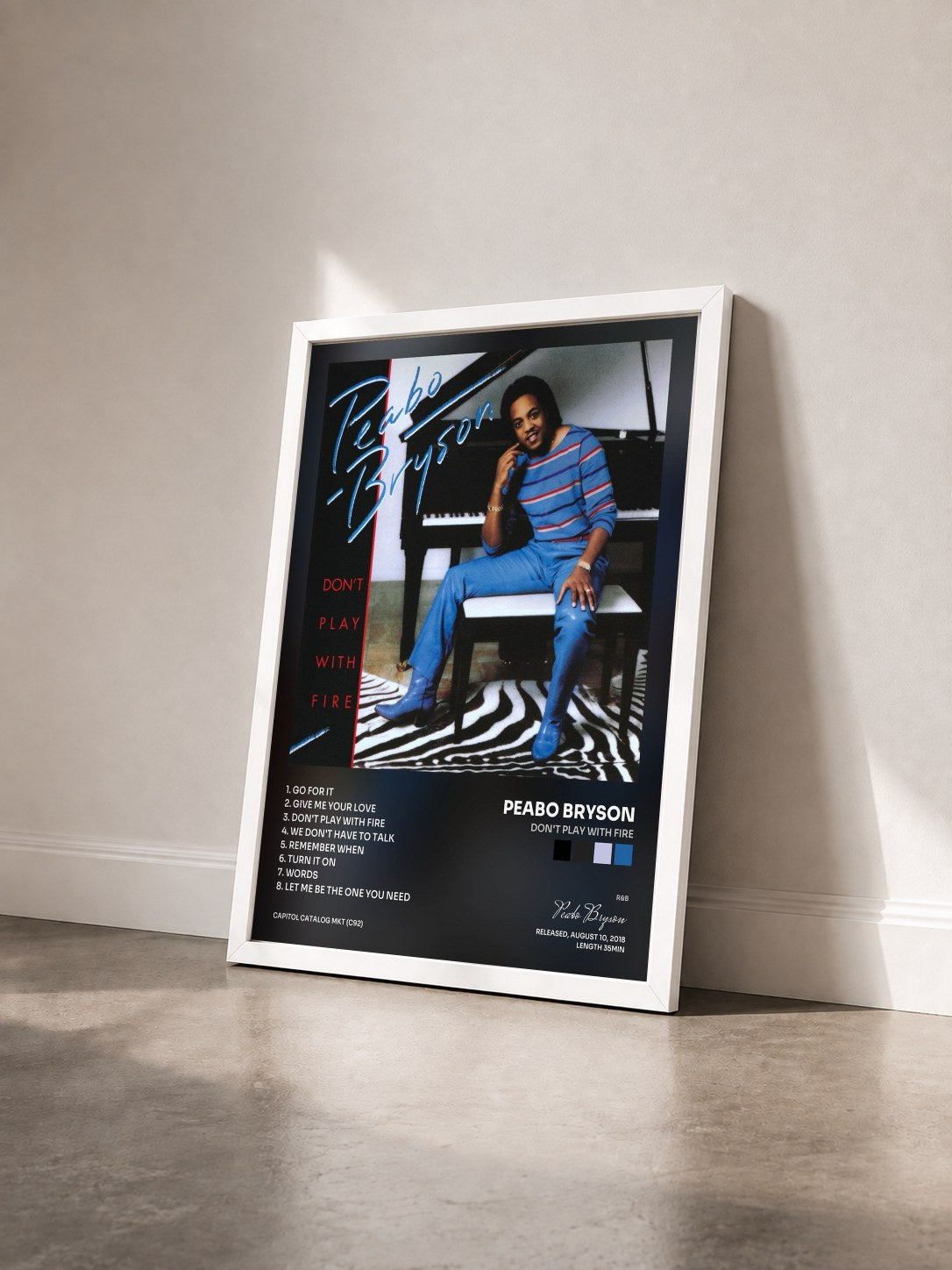 #blanc Tableau de l'album Don't Play With Fire de Peabo Bryson vu de trois quarts, cadre blanc