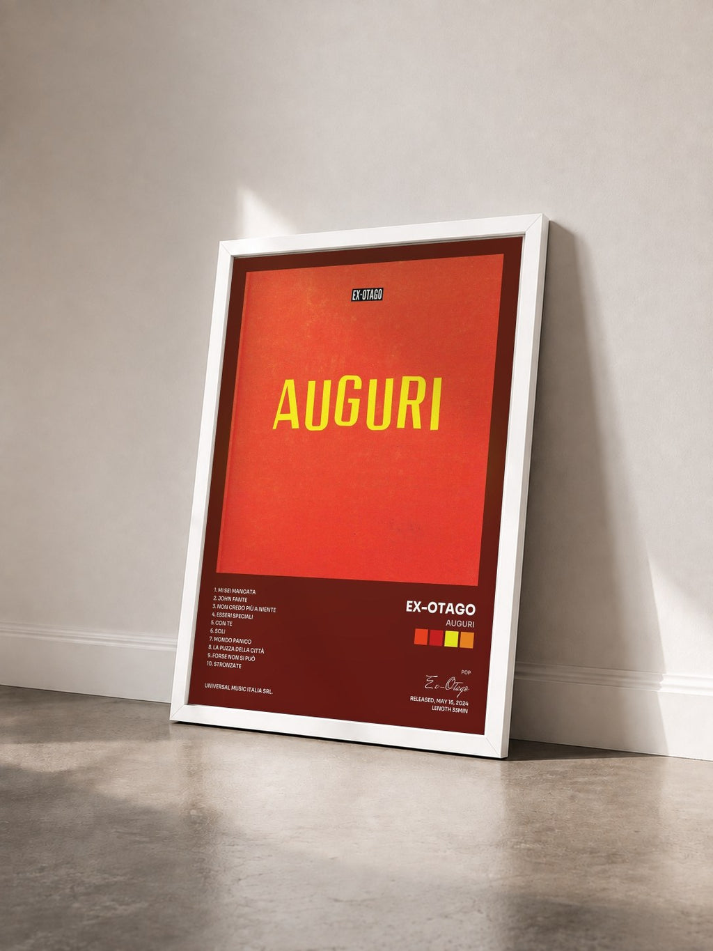 #blanc Tableau de l'album Auguri de Ex-Otago vu de trois quarts, cadre blanc