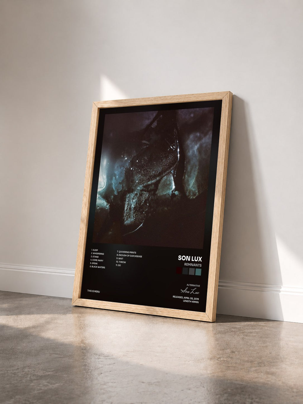 #bois Tableau de l'album Remnants de Son Lux vu de trois quarts, cadre en bois brut