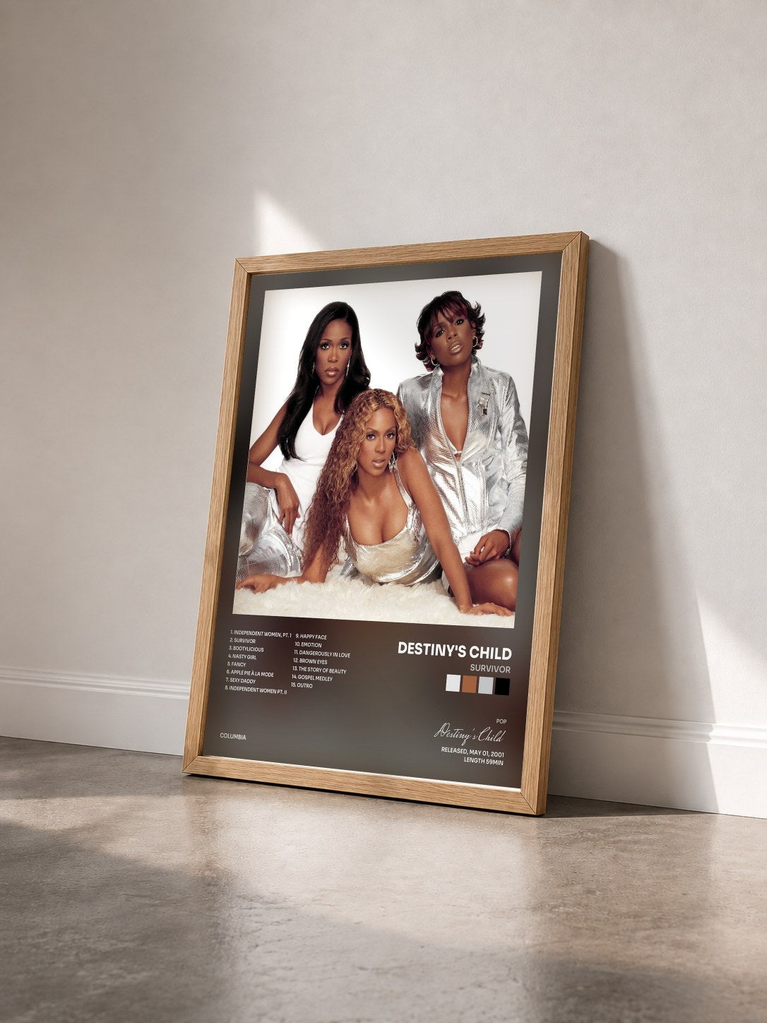 #bois Tableau de l'album Survivor de Destiny's Child vu de trois quarts, cadre en bois brut