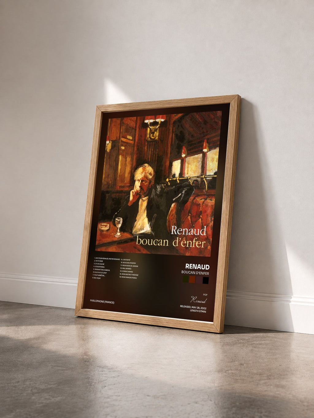 #bois Tableau de l'album Boucan d'enfer de Renaud vu de trois quarts, cadre en bois brut