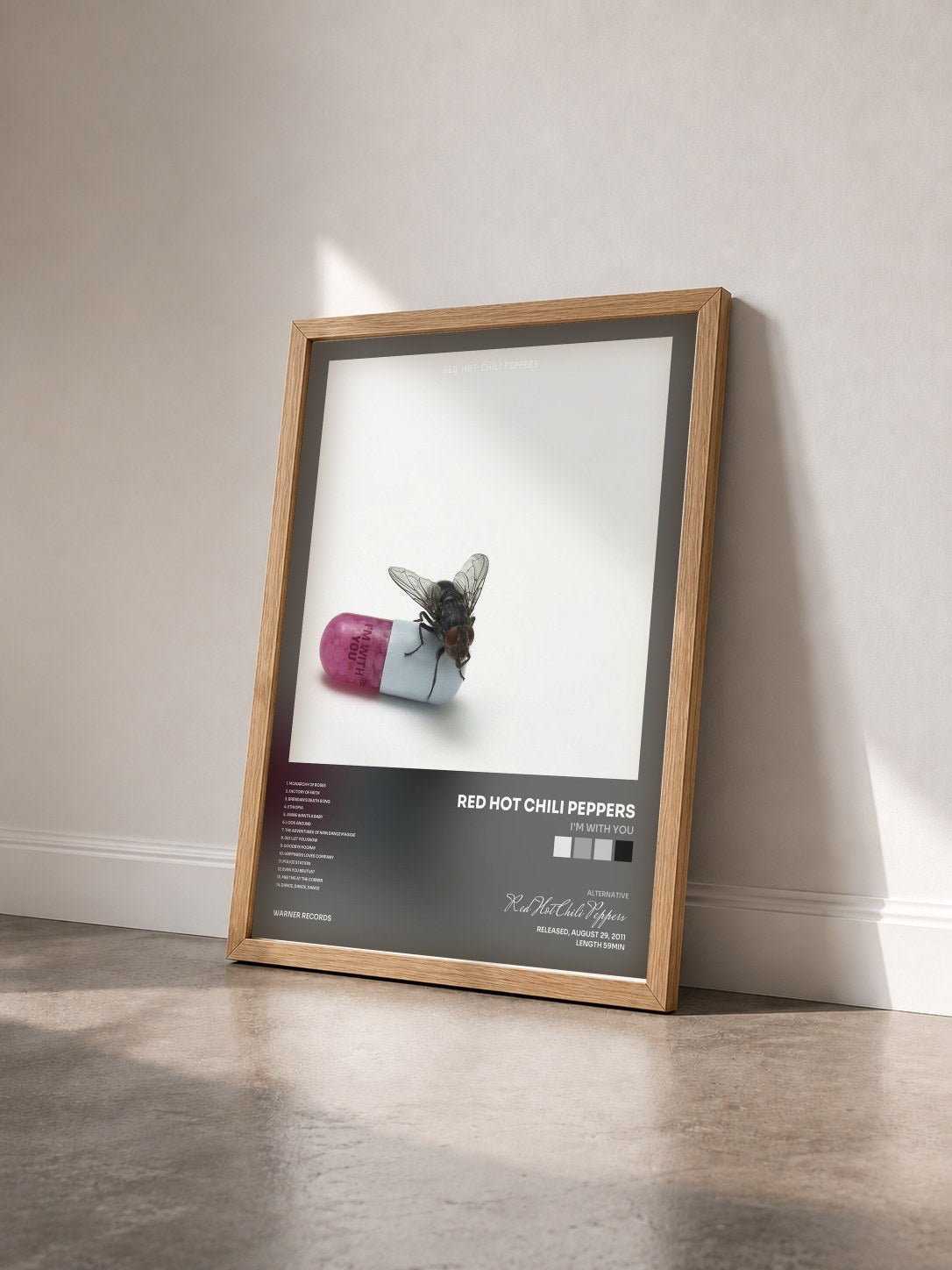 #bois Tableau de l'album I'm with You de Red Hot Chili Peppers vu de trois quarts, cadre en bois brut
