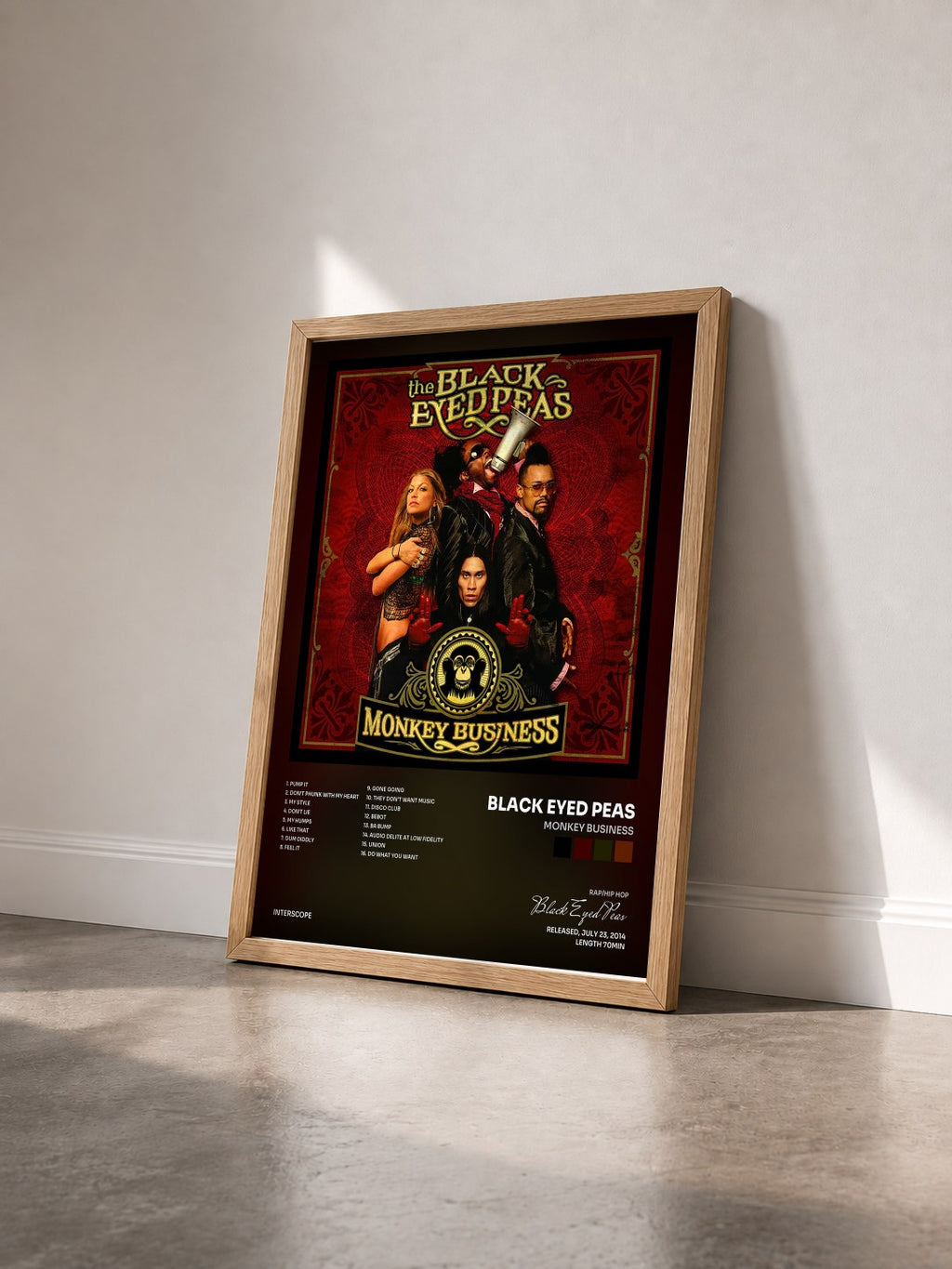 #bois Tableau de l'album Monkey Business de Black Eyed Peas vu de trois quarts, cadre en bois brut