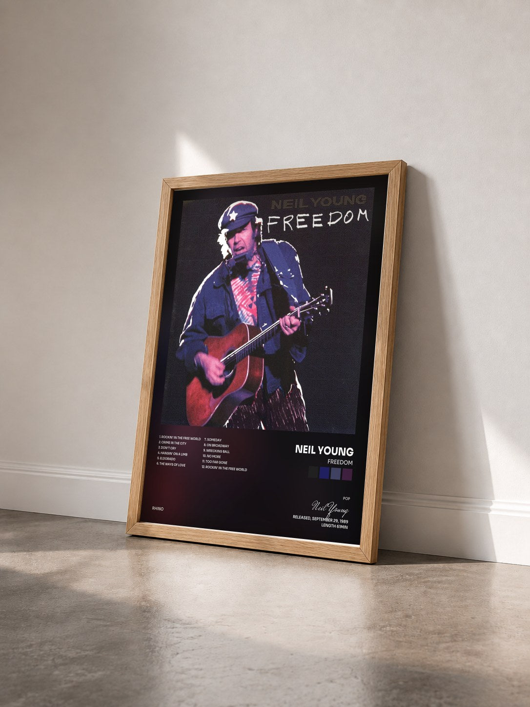 #bois Tableau de l'album Freedom de Neil Young vu de trois quarts, cadre en bois brut
