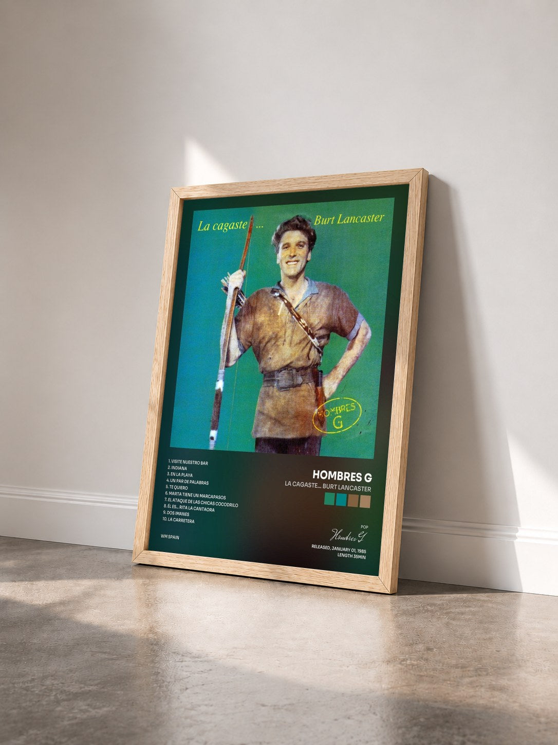 #bois Tableau de l'album La Cagaste... Burt Lancaster de Hombres G vu de trois quarts, cadre en bois brut