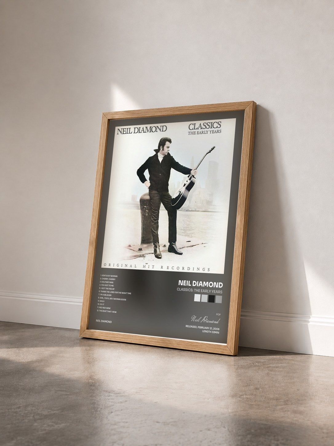 #bois Tableau de l'album Classics: The Early Years de Neil Diamond vu de trois quarts, cadre en bois brut