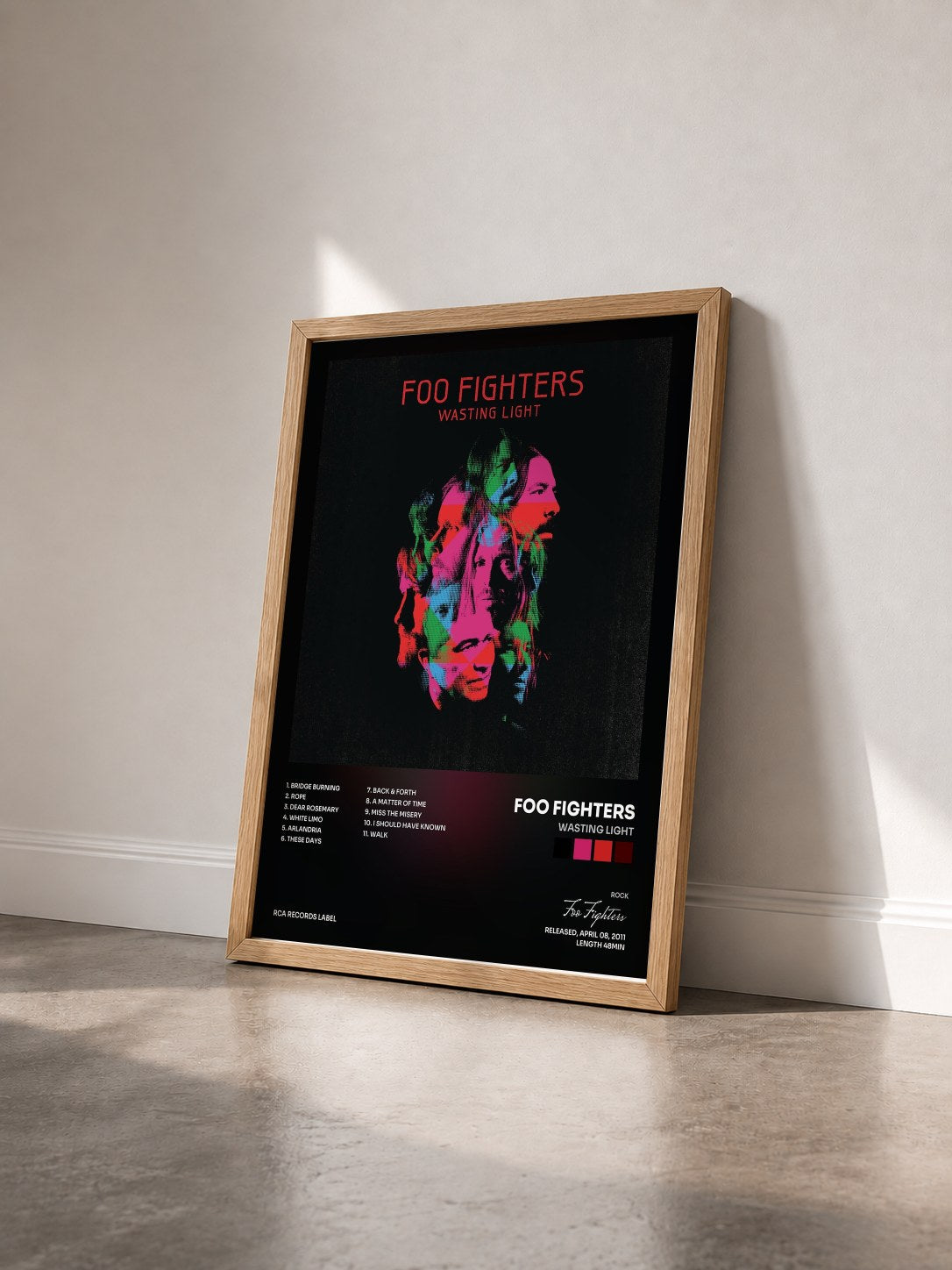 #bois Tableau de l'album Wasting Light de Foo Fighters vu de trois quarts, cadre en bois brut
