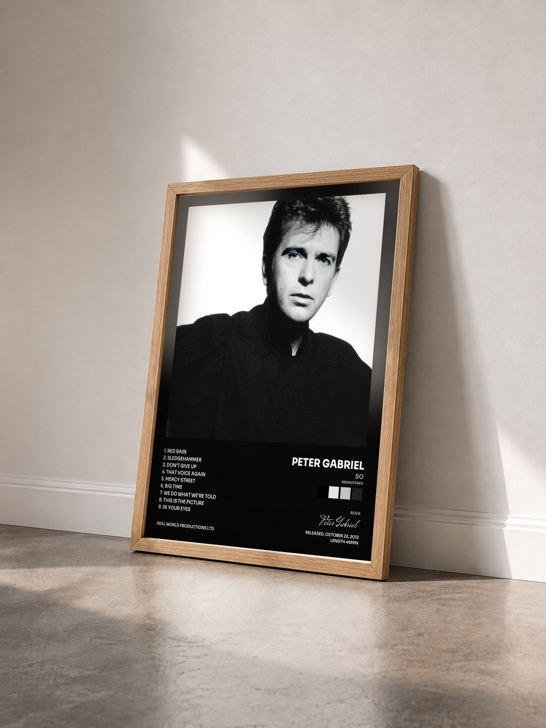 #bois Tableau de l'album So (Remastered) de Peter Gabriel vu de trois quarts, cadre en bois brut