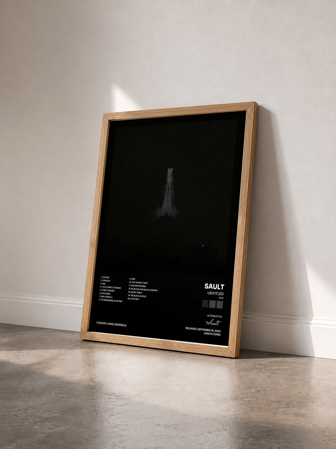#bois Tableau de l'album Untitled (Rise) de Sault vu de trois quarts, cadre en bois brut