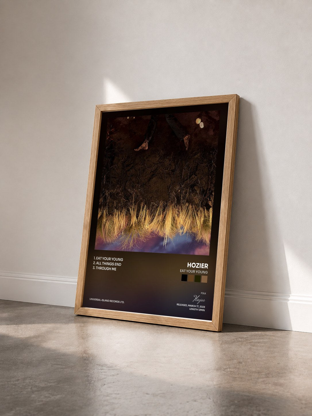 #bois Tableau de l'album Eat Your Young de Hozier vu de trois quarts, cadre en bois brut