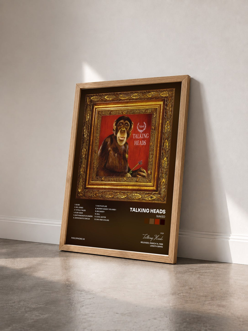 #bois Tableau de l'album Naked de Talking Heads vu de trois quarts, cadre en bois brut