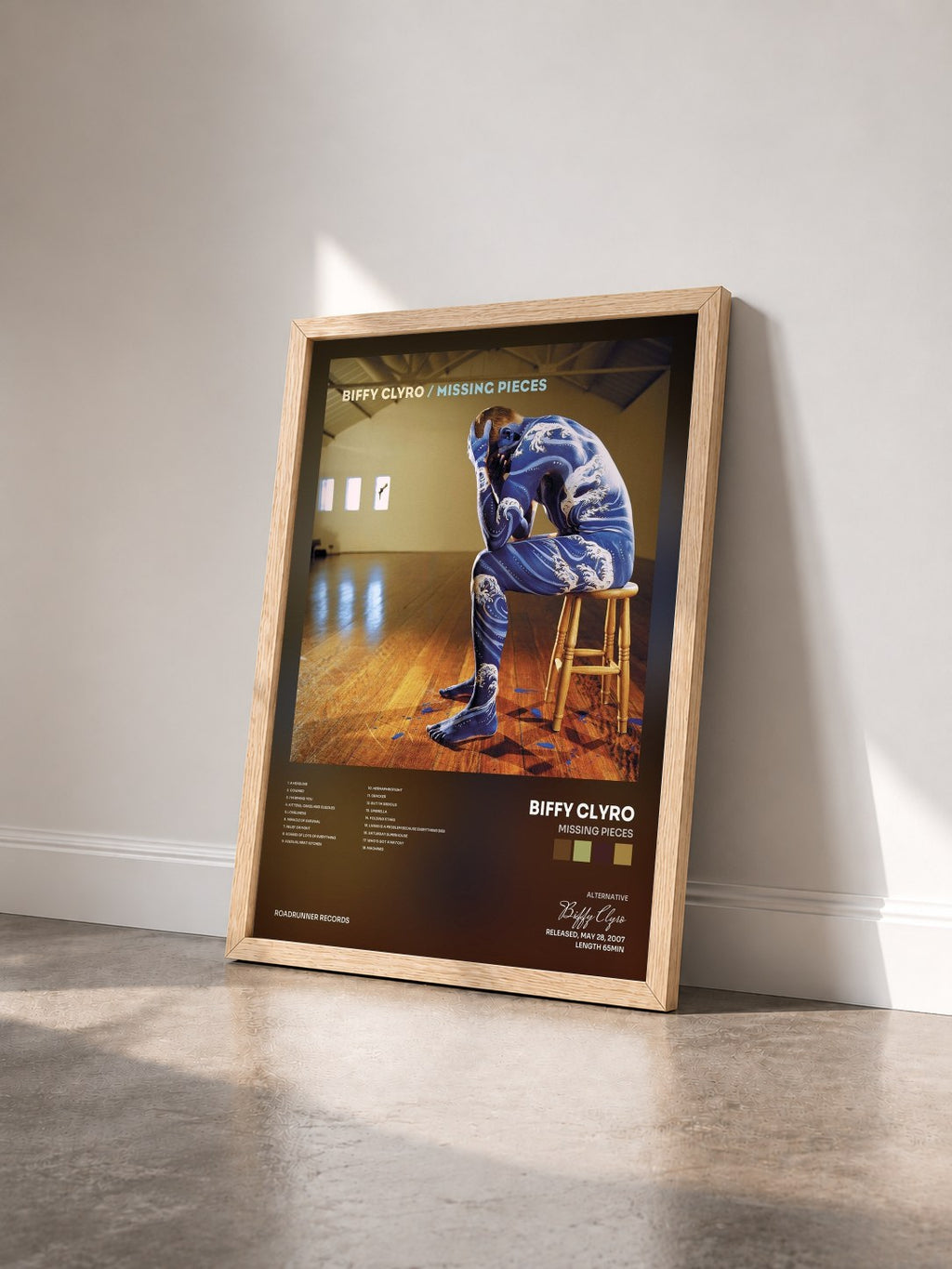 #bois Tableau de l'album Missing Pieces de Biffy Clyro vu de trois quarts, cadre en bois brut